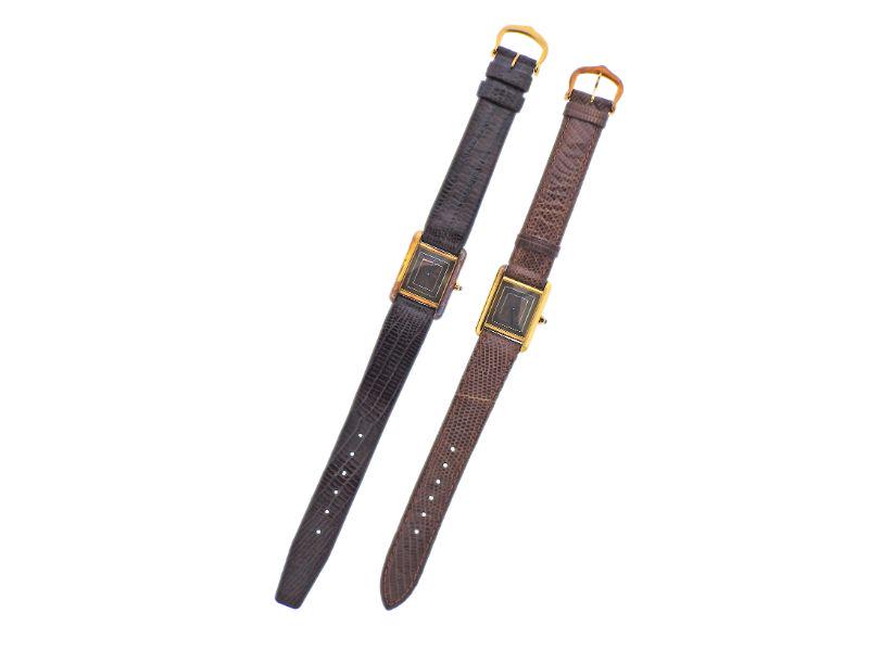 Must de Cartier Vermeil Watch Lot of 2: Lot of two vermeil must de Cartier watches, with tri color dials. Original bands and buckles. Case is 21mm x 28mm. Both not working.