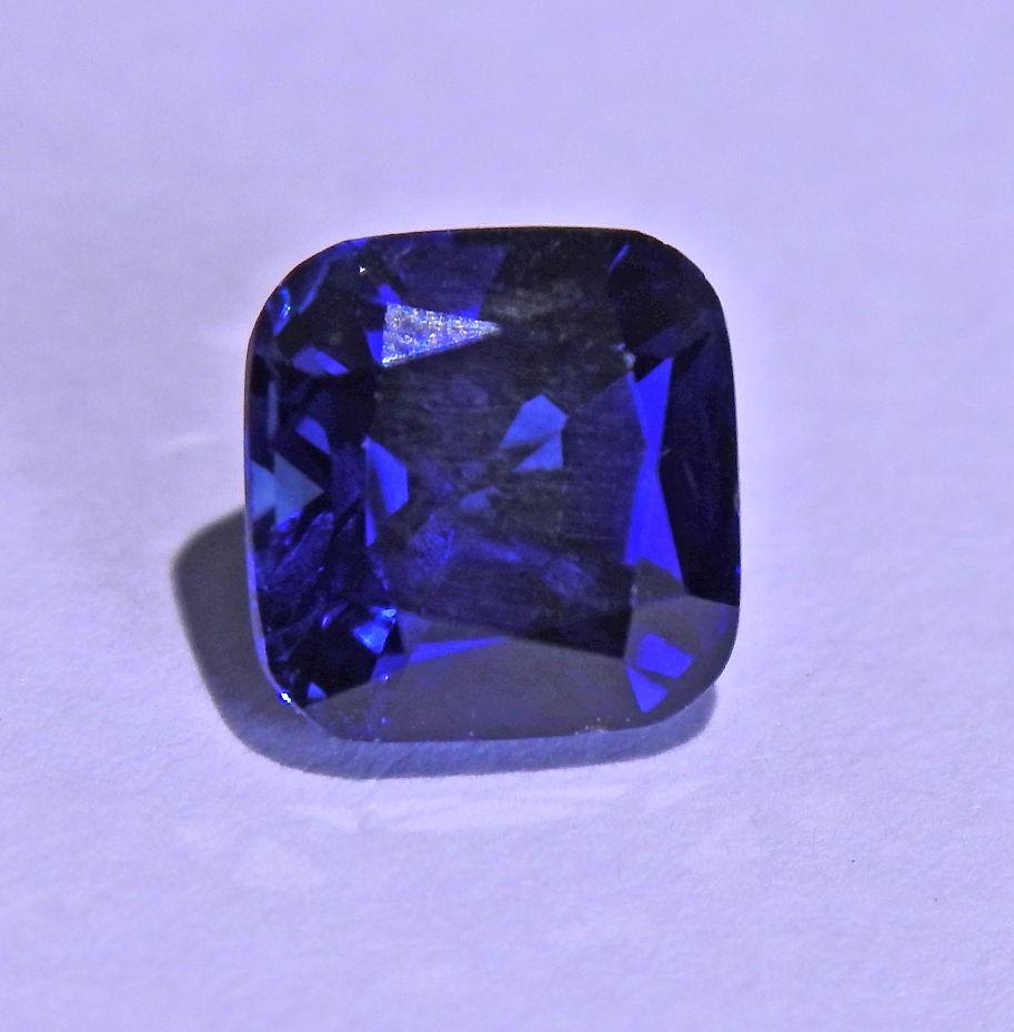 AGL 2.33ct No Heat Cushion Blue Sapphire Gemstone: Loose 2.33ct AGL certified no heat Cambodian sapphire, measuring approx. 7.10 x 7.02 x 4.88mm.