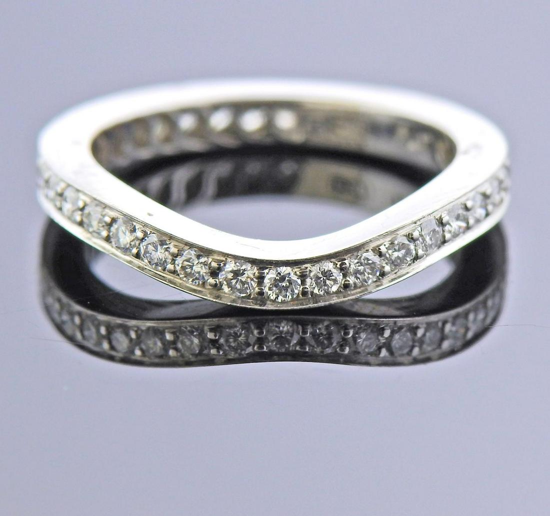 McTeigue Platinum Diamond Wave Eternity Wedding Band: Platinum McTeigue wave eternity band ring with approx. 0.34ctw in diamonds (full circle). Ring size - 4.75, ring is 2.4mm wide. Marked: McT, Plat. Weight - 3.6 grams.