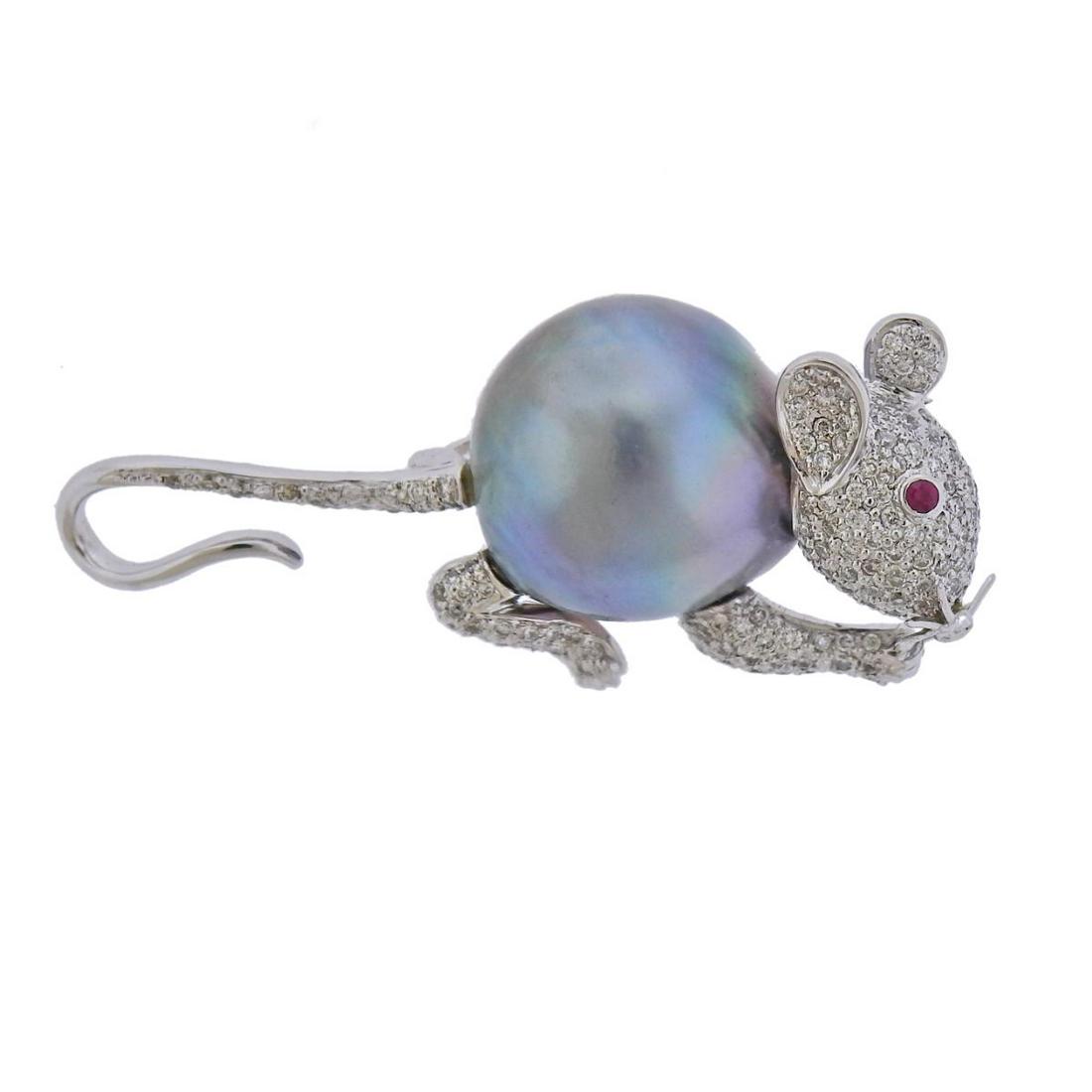 18k Gold Diamond Tahitian South Sea Pearl Diamond Ruby: 18k gold mouse brooch, with 15.8mm South Sea Tahitian pearl, with ruby eye and approx. 0.40ctw in diamonds. Brooch measures 45mm x 20mm. Tested 18k. Weight - 13.5 grams.