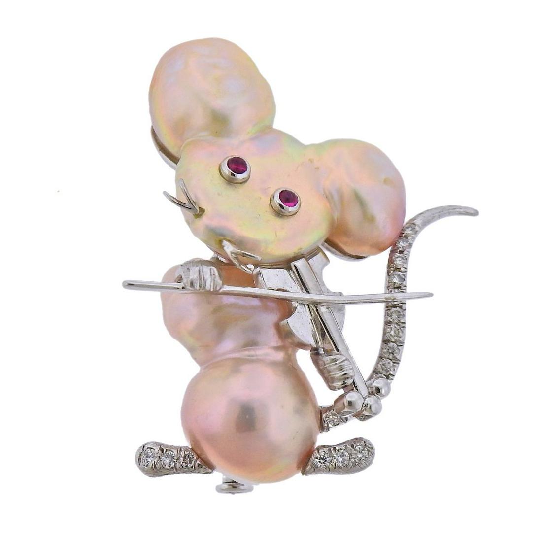 18k Gold Baroque Pearl Diamond Ruby Violinist Mouse: 18k gold mouse playing the violin brooch, with Baroque pearls , ruby eyes and approx. 0.16ctw in diamonds. Brooch measures 36mm x 26mm. Tested 18k. Weight - 12.8 grams.