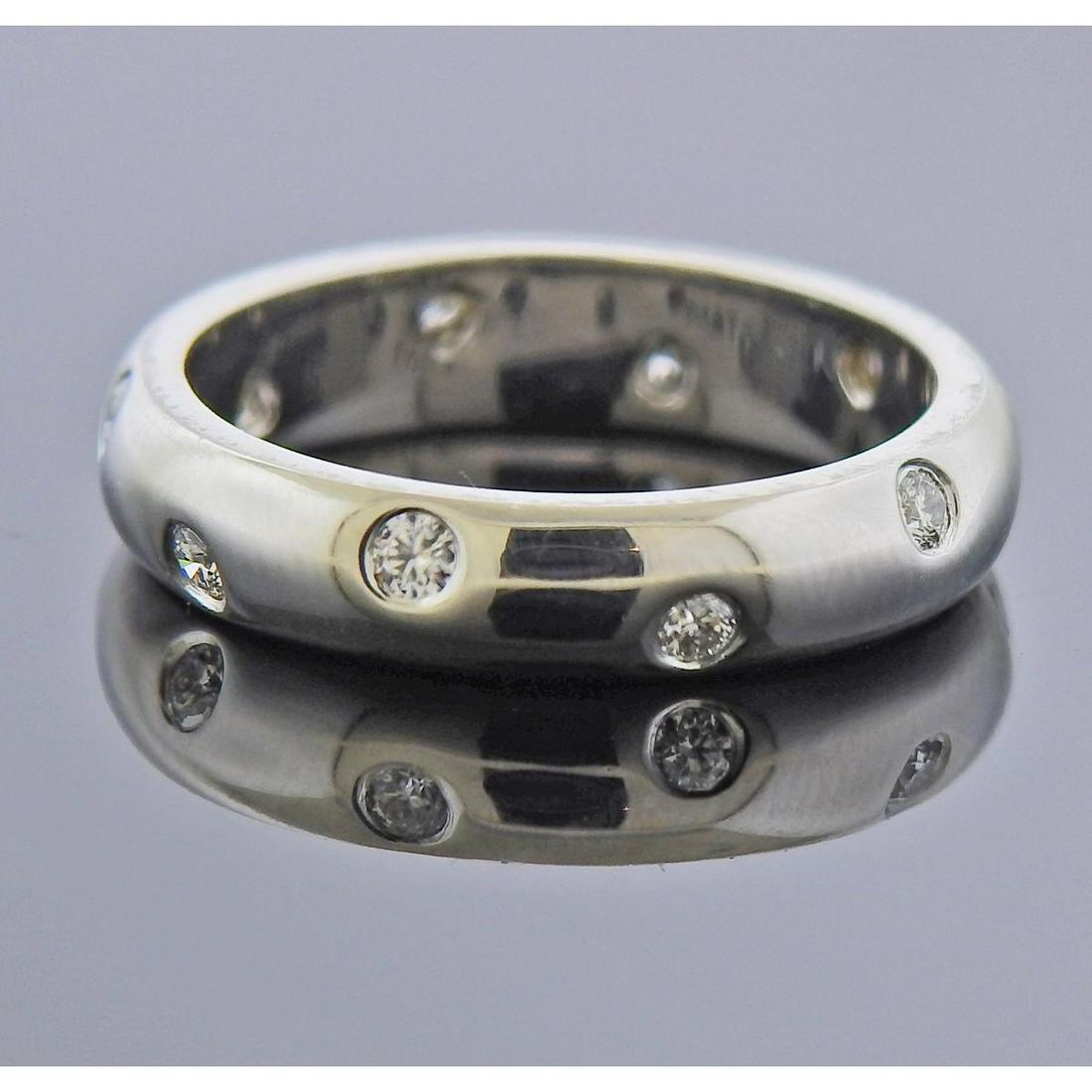 Tiffany & Co Etoile Platinum Diamond Band Ring: Platinum band ring by Tiffany & Co from Etoile collection, with approx. 0.30ctw in diamonds. Ring size - 5, ring is 4mm wide. Marked: Pt950, T & Co. Weight - 6.5 grams.