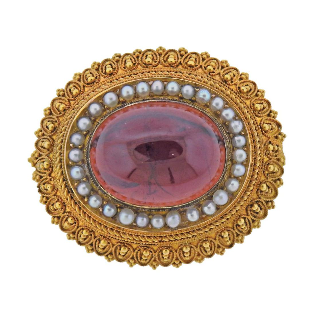 Etruscan Antique 14k Gold Garnet Pearl Brooch Pin: Antique Etruscan 14k gold brooch, with center 20.2mm x 16mm garnet, surrounded with pearls. Brooch is 38mm x 33mm. Tested 14k. Weight - 15.9 grams.