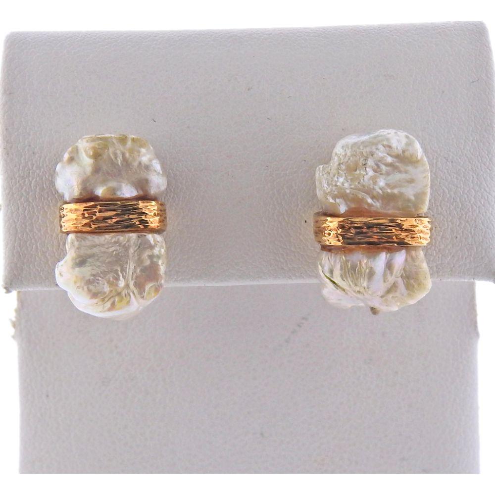 Ruser 14k Gold MOP Earrings: Ruser 14k yellow gold MOP earrings. Earrings measure 19mm long x 11mm at widest point. Marked - Ruser, 14k. Weight - 9 grams.