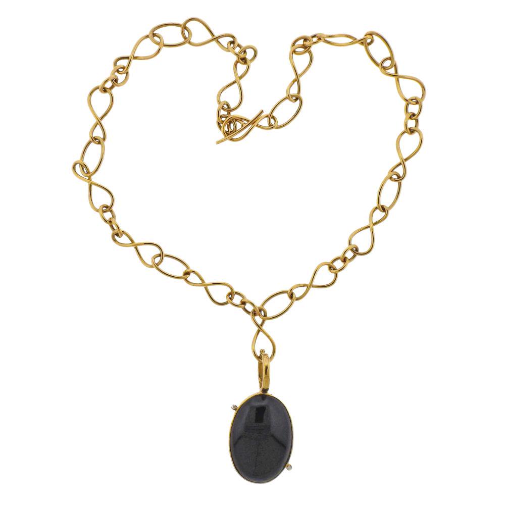 Faraone Mennella 18K Gold Onyx Diamond Pendant Necklace: Italian 18k gold pendant necklace by Faraone Mennella with onyx and approx. 0.02ctw in diamonds. Necklace is 17.5" long and 19.5mm at the widest point. Removable pendant - 46mm long with bail x 14mm w