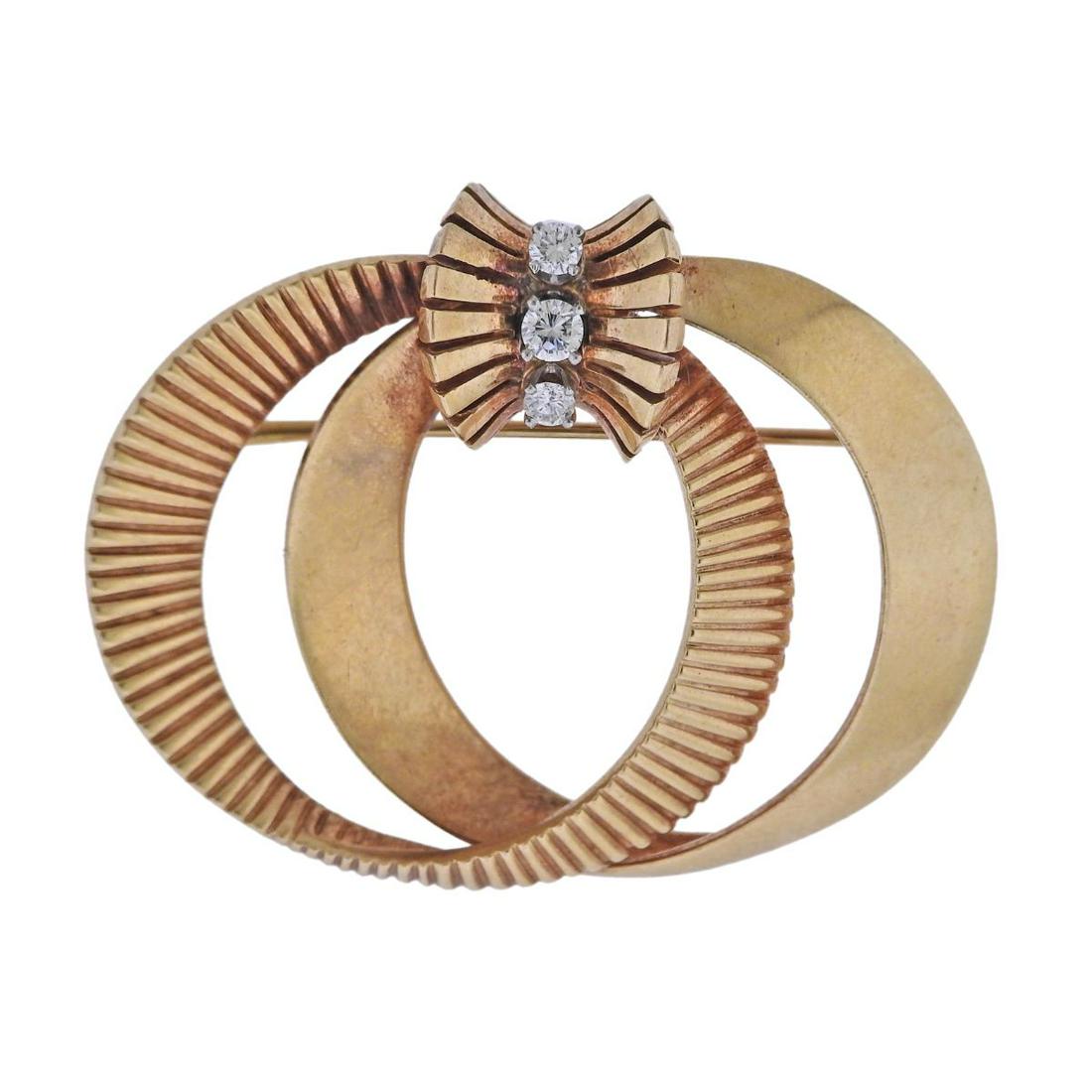 McTeigue Retro 14k Gold Diamond Brooch Pin: Retro 14k gold brooch by McTeigue, with approx. 0.20ctw in diamonds. Brooch is 43mm x 35mm. Marked with Maker's mark, 14k. Weight - 14 grams.