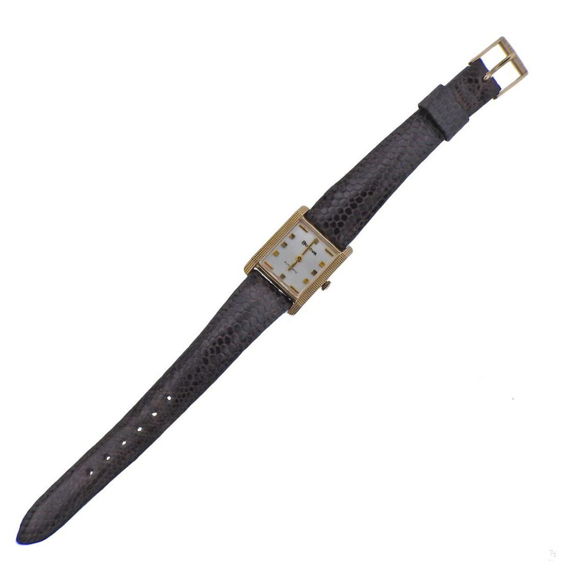 Bulova Vintage 14k Gold Automatic Watch: Vintage Bulova 14k gold automatic watch. Case - 23mm excl crown x 31mm. Leather band and gold tone buckle - all original Land is 7.5" long. Not working order.