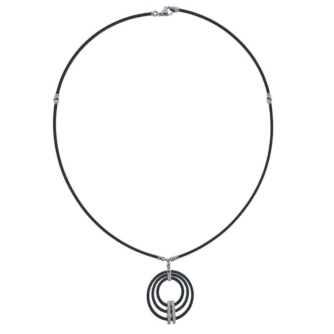 Charriol Celtic Noir 18k Gold Steel Diamond Necklace: 18k gold and black steel Celtic Noir necklace with circle pendant, by Charriol, with approx. 0.11ctw in diamonds. New with tag, Retail $895. Necklace is 17" long, pendant - 27mm in diameter. Marked: C