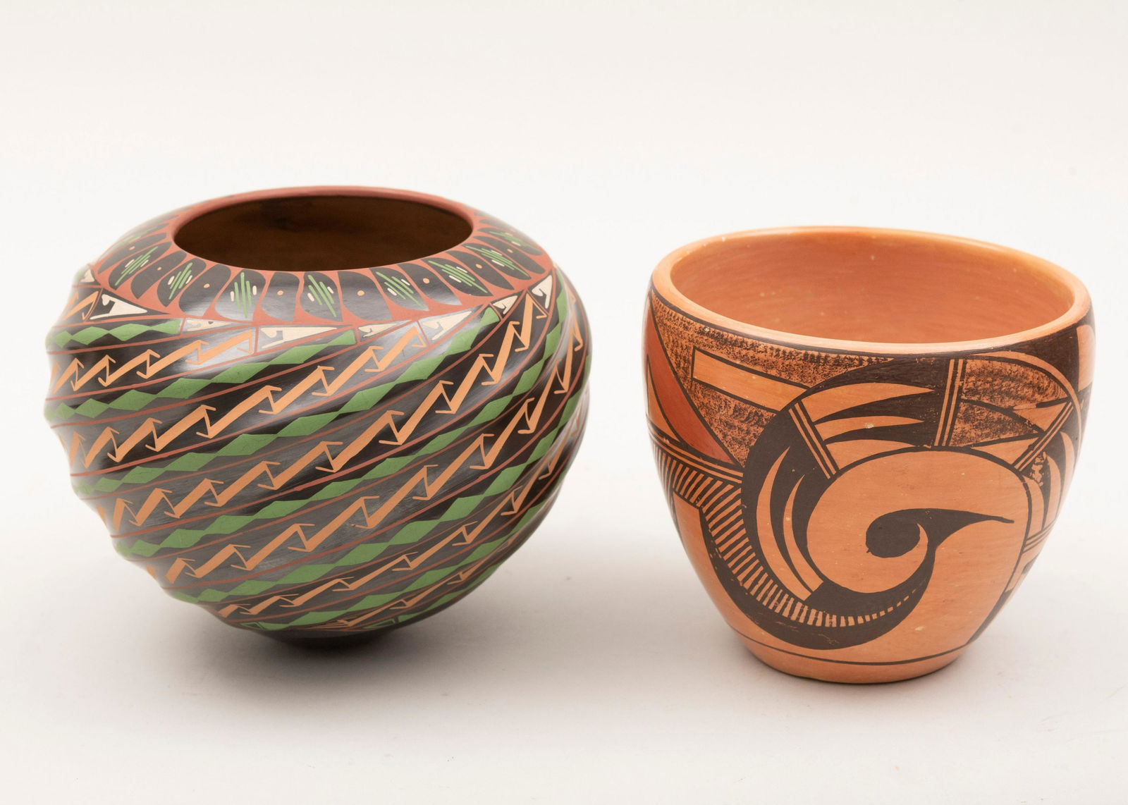 Two Native American Pottery Vessels, Verla Dewakuku and: Two Native American Pottery Vessels Verla Dewakuku and Yoli RodriguezBoth with geometric designs.Height of tallest: 5 inches