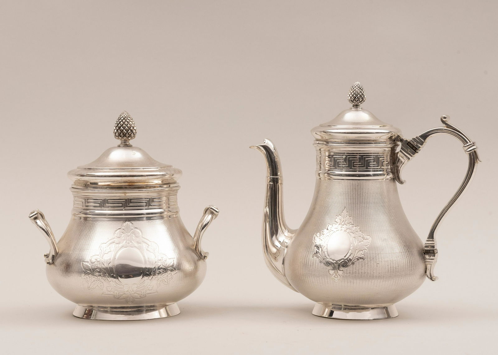 Antique French Christofle Hotelware Coffeepot and Sugar: Antique French Christofle Hotelware Coffeepot and Sugar Bowl Rose Victoria PatternHighly decorated with greek key pattern and acorn finials.