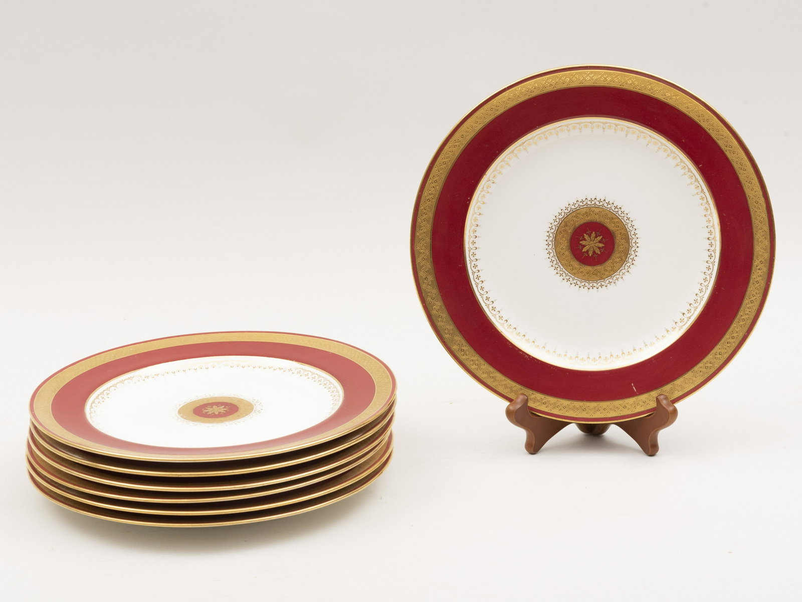 Seven Antique Minton England Dinner Plates with Red and: Seven Antique Minton England Dinner Plates with Red and Gold Rim.