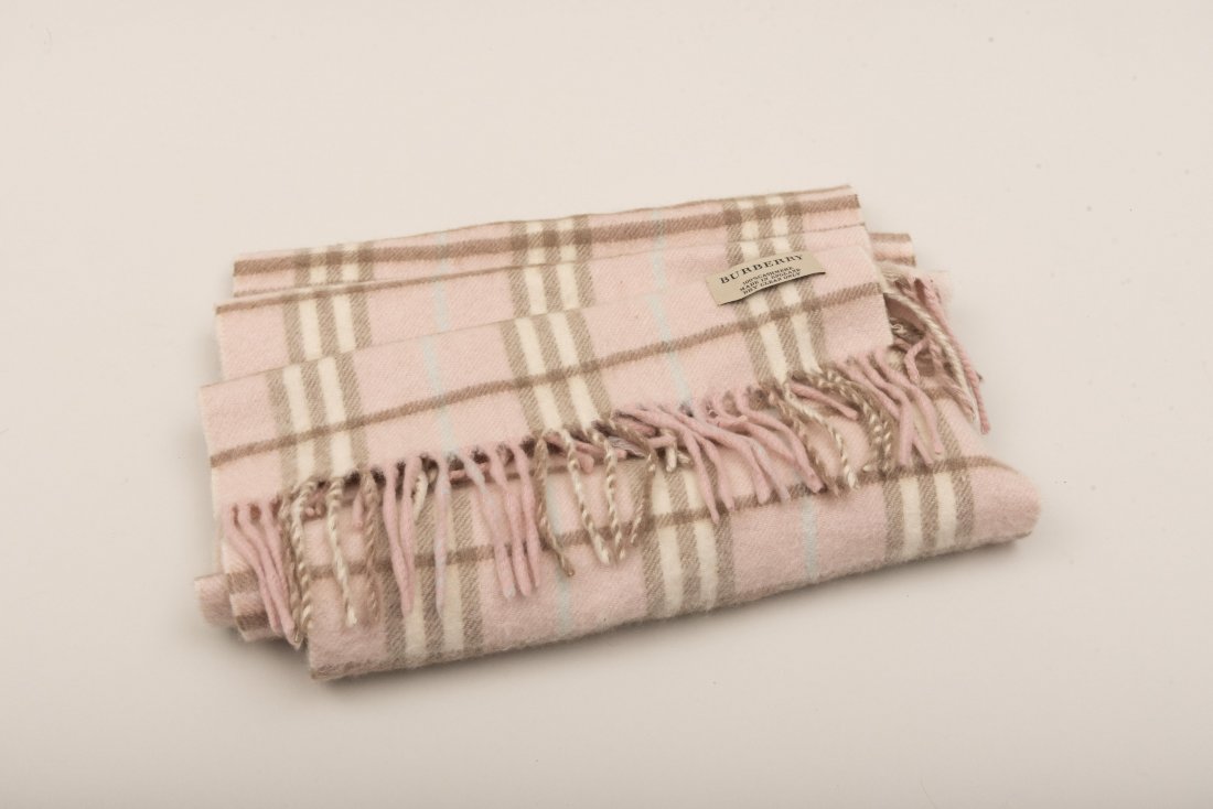 Burberry Pink Plaid Cashmere Scarf: Burberry Pink Plaid Cashmere ScarfPink Plaid Cashmere ScarfPale pink light blue white and tan Burberry scarf. Tag reads Burberry 100% Cashmere Made in England Dry Clean Only.