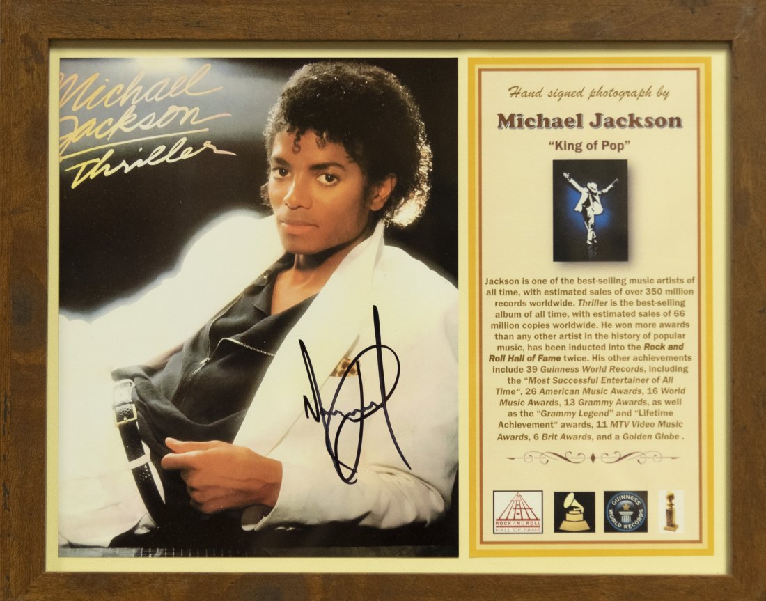 Michael Jackson Signed Photo 11 x 14 inches: Michael Jackson Signed Photo Hand signed photo by Michael Jackson "King of Pop!". It's the "Thriller" photo used on his best selling album cover; in fact recognized as THE best selling album of all ti