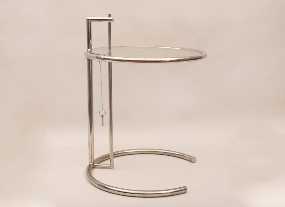 An Eileen Gray Adjustable Height Side Table in Chrome: An Eileen Gray Adjustable Height Side Table in Chrome and Glass