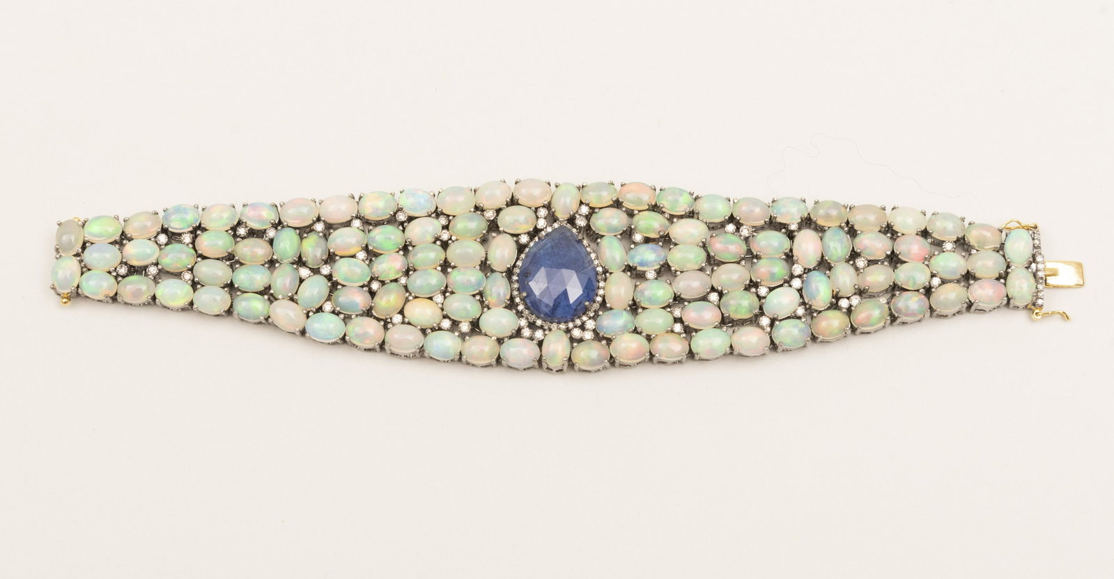 Opal, Tanzanite and Diamond Victorian Style Bracelet: Opal Tanzanite and Diamond Victorian Style Bracelet Opal Tanzanite and Diamond Victorian Style Bracelet set in sterling silver with gold wash; diamond 1.5 cts. opal 56 cts. tanzanite 12.50 cts.; 7 inc