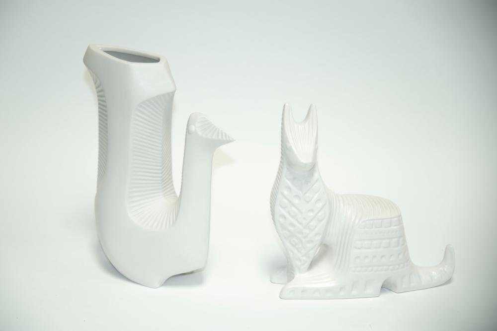 Jonathan Adler, American (b. 1966): From Menagerie: Bird and Cat, unglazed and glazed white porcelain vases, each marked underneath and with original stickers. Heights: 10 1/2 and 9 inches