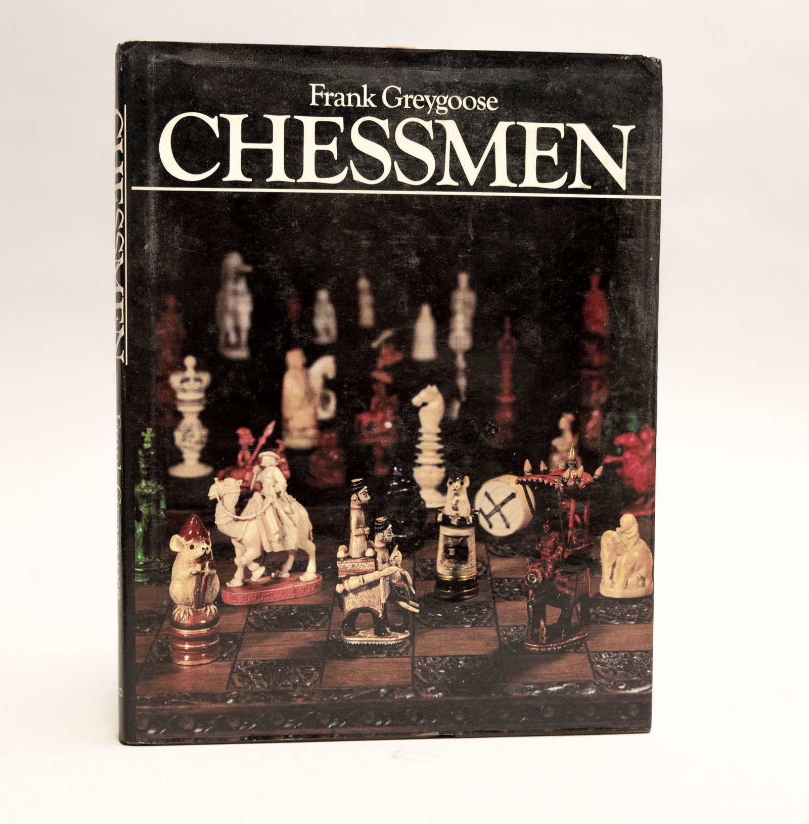 Chessmen, by Frank Greygoose, Arco Publishing, Inc.,: Chessmen, by Frank Greygoose, Arco Publishing, Inc., New York, 1979. Large octavo, black boards, 160 pp. Condition: Excellent, noting small dent to bottom edge of front board, slight shelfwear to dj. 