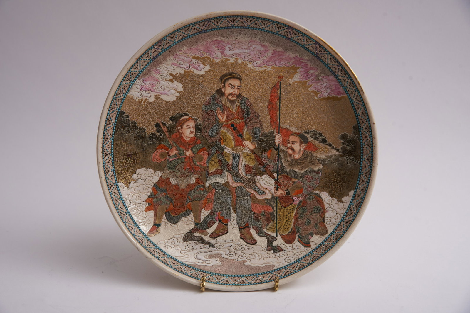 Japanese Earthenware Charger 9.75" in diameter: Japanese Earthenware Charger The bowl enameled and painted with 3 warriors. the rim highlighted with a double row of turquoise enamel beads. Property from a Prominent Saint Louis Estate 9.75" in 