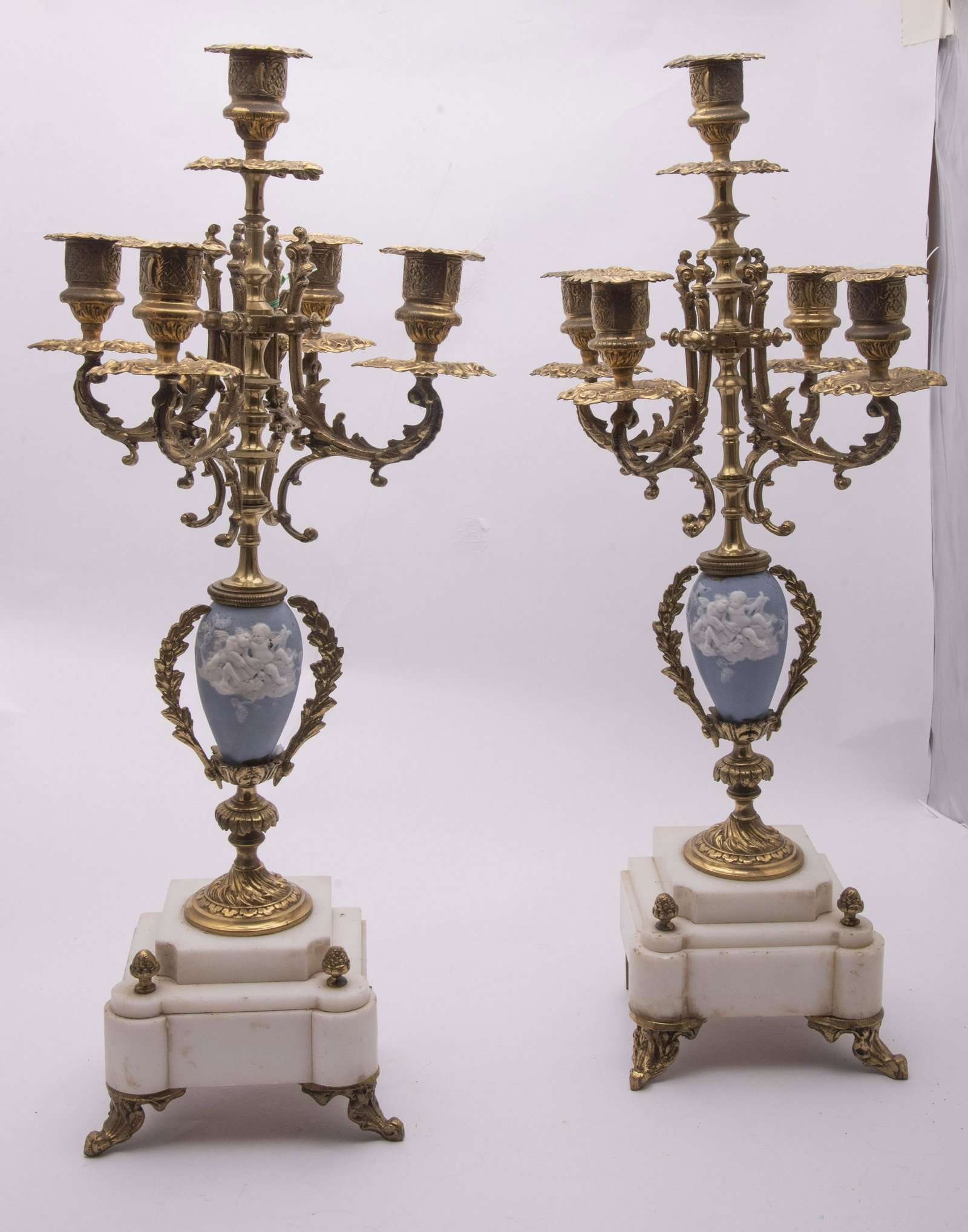 Pair of 19th Century Candelabra 19" tall: Pair of 19th Century Candelabra Marble, Jasperware, gilt metal 5 arm candelabra garnitures with original candle snuffs. The Jasperware mounts depicting frolicking cupids. 19" tall