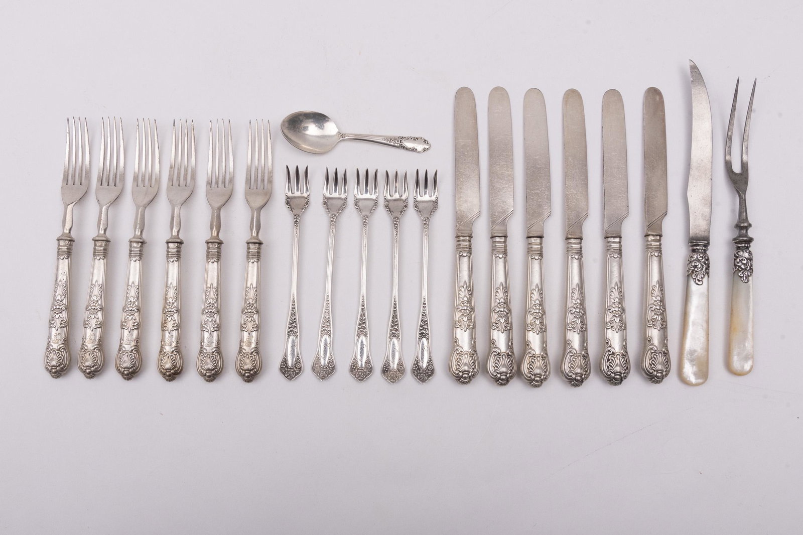 Collection of Assorted Sterling and Plated Items,: Collection of Assorted Sterling and Plated Items, Cocktail Forks, Fruit Service, Carving Set (20 pieces total) Comprising of: 5 Plated "Rogers" Cocktail Forks 6 Pair English Sterling Handled