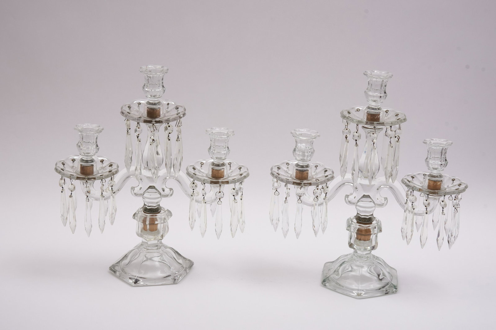 Pair of Crystal Heisey style Candelabra 15" tall: Pair of Crystal Heisey style Candelabra 3 arm candelabra with associated crystal prisms 15" tall