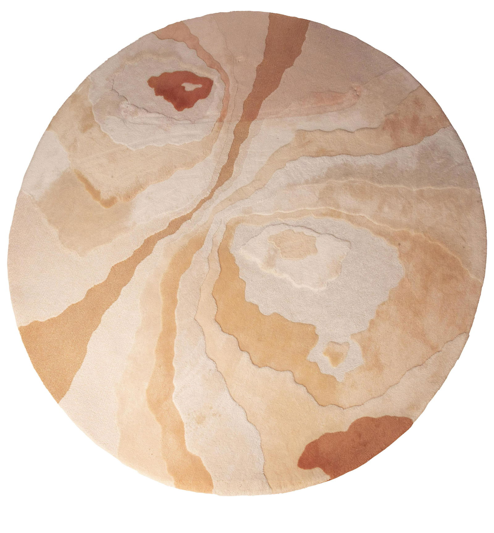Edward Fields Sculpted Wool Pile Carpet, 1990: Circular rug in shades of off white, tan and peach, with layered tiers and one section incorporating glitter thread. diameter: 10 feet.