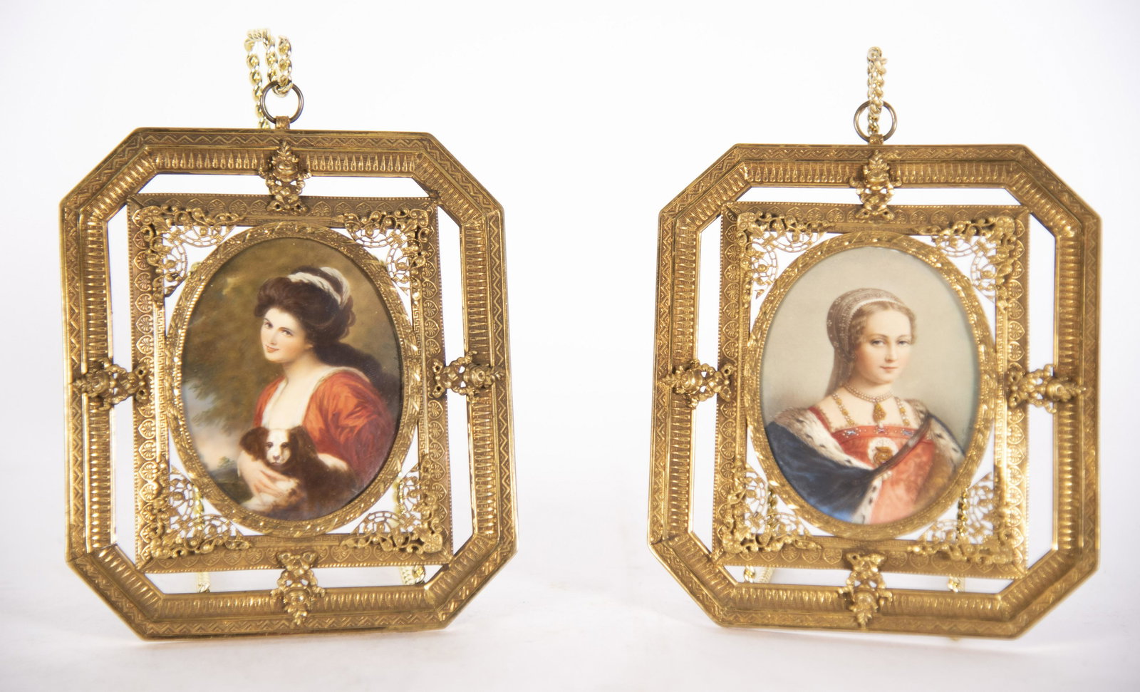 Pair of Finely Painted Portrait Miniatures: Pair of Finely Painted Portrait MiniaturesA painting of a woman in an elaborate Renaissance costume with fine jewels and an ermine trimmed cloak.A painting of a woman with flowing hair and holding a s