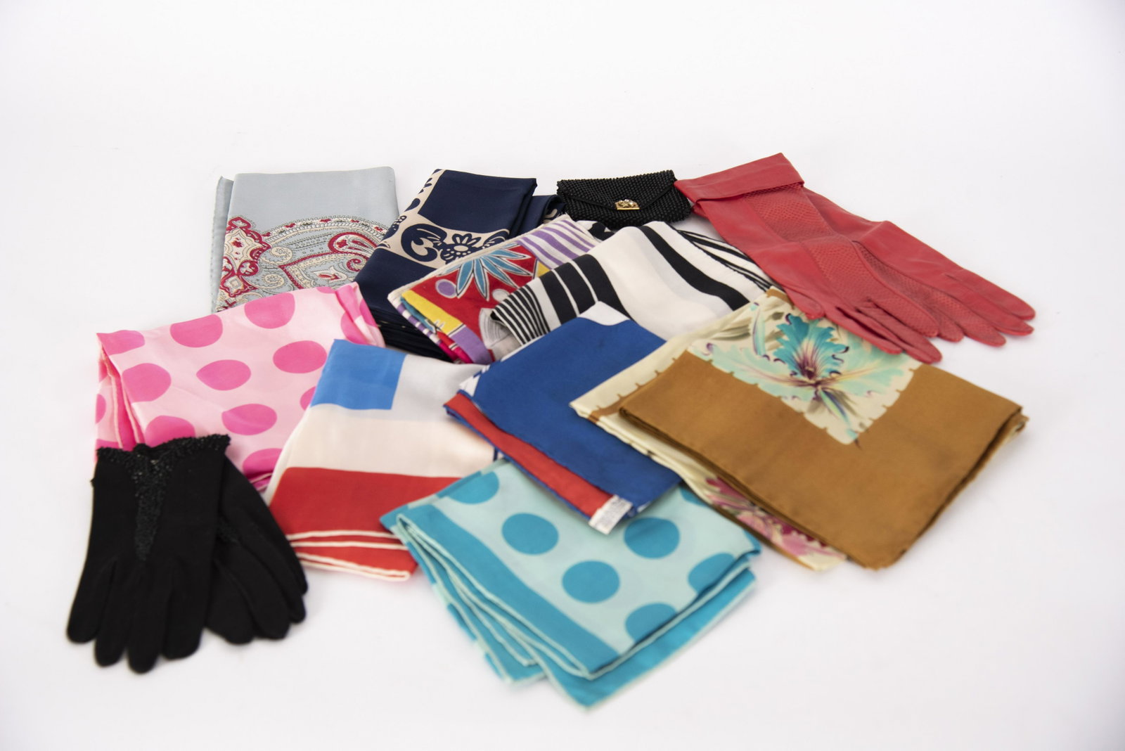 Nine Vintage Scarves and Two Pairs Gloves: Nine Vintage Scarves and Two Pairs Gloves Six silk scarves by Vera, one marked Renita; two pairs vintage ladies' gloves, one black dress cotton with black bead decoration, black beaded coin purse with