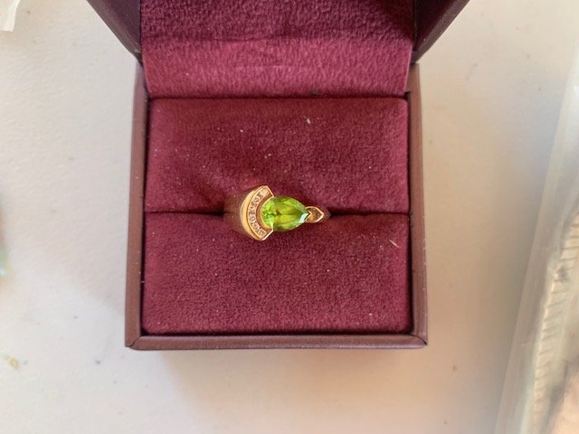 14k Diamond and Natural Peridot Ring size 7: 14k Diamond and Natural Peridot Ring Total gross weight: 8.28 grams. Peridot size: 9mm by 5mm size 7