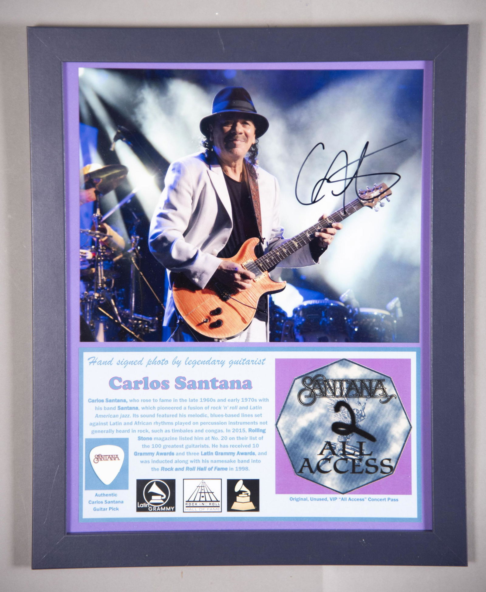 Santana Signed Photo/ Pass/ Pick 11x14: Santana Signed Photo/ Pass/ PickHand signed photo by Carlos Santana, premier rock guitarist with his distinctive Latin flair. Viewed as a true icon for over four decades, worldwide. Rock and Roll Hall