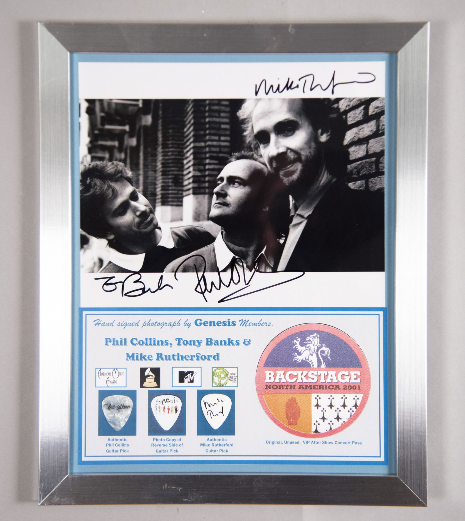 Genesis Signed Photo/ VIP Pass/ Two Picks 11x14 inches: Genesis Signed Photo/ VIP Pass/ Two PicksHand signed photo by classic members of Genesis: Phil Collins, Tony Banks and Mike Rutherford, the quintessential English rock band, formed in Surrey, who sold