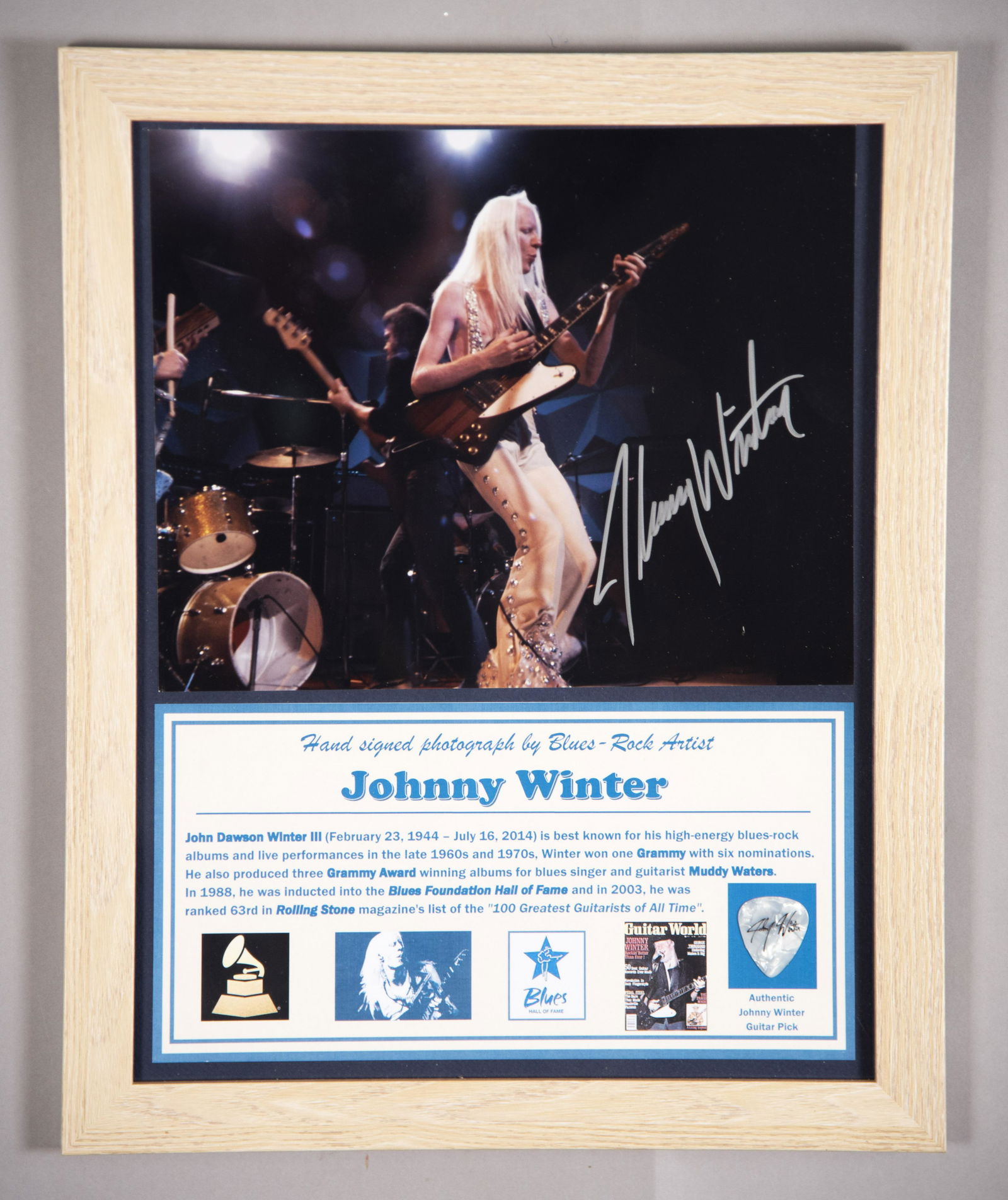 Johnny Winter Signed Photo/ Pick 11x14 inches: Johnny Winter Signed Photo/ PickHand signed photo by consummate blues-rocker, Johnny Winter, whose high-energy concerts were/still are memorable. Included his signature guitar pick. Certificate of Aut