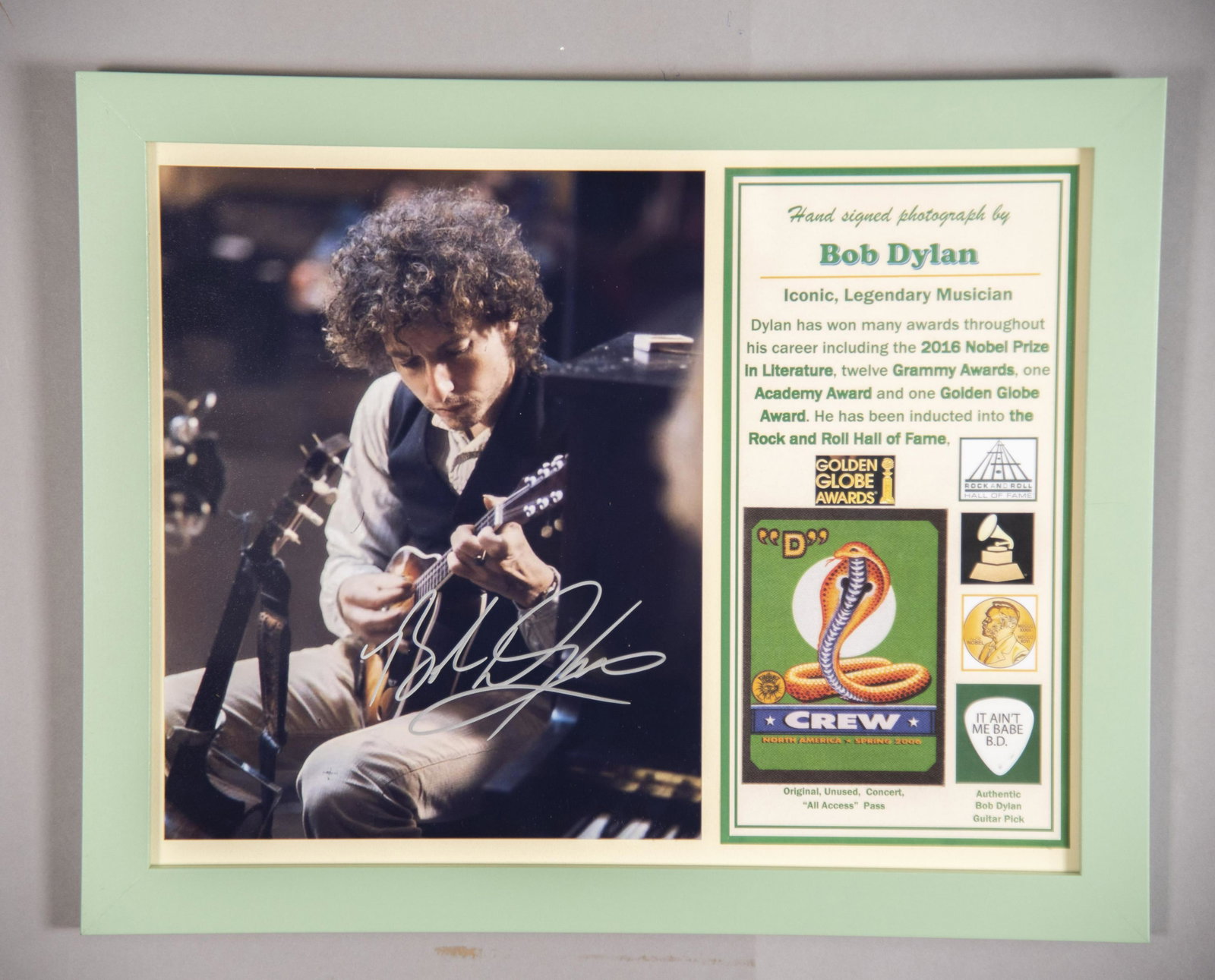 Bob Dylan Signed Photo/ Pass/ Pick 11x14 inches: Bob Dylan Signed Photo/ Pass/ Pick Hand signed photo by legendary Bob Dylan. Too many awards to list, but 2016 Nobel Peace Prize stands out. Ensemble includes unused concert pass and his signature gui