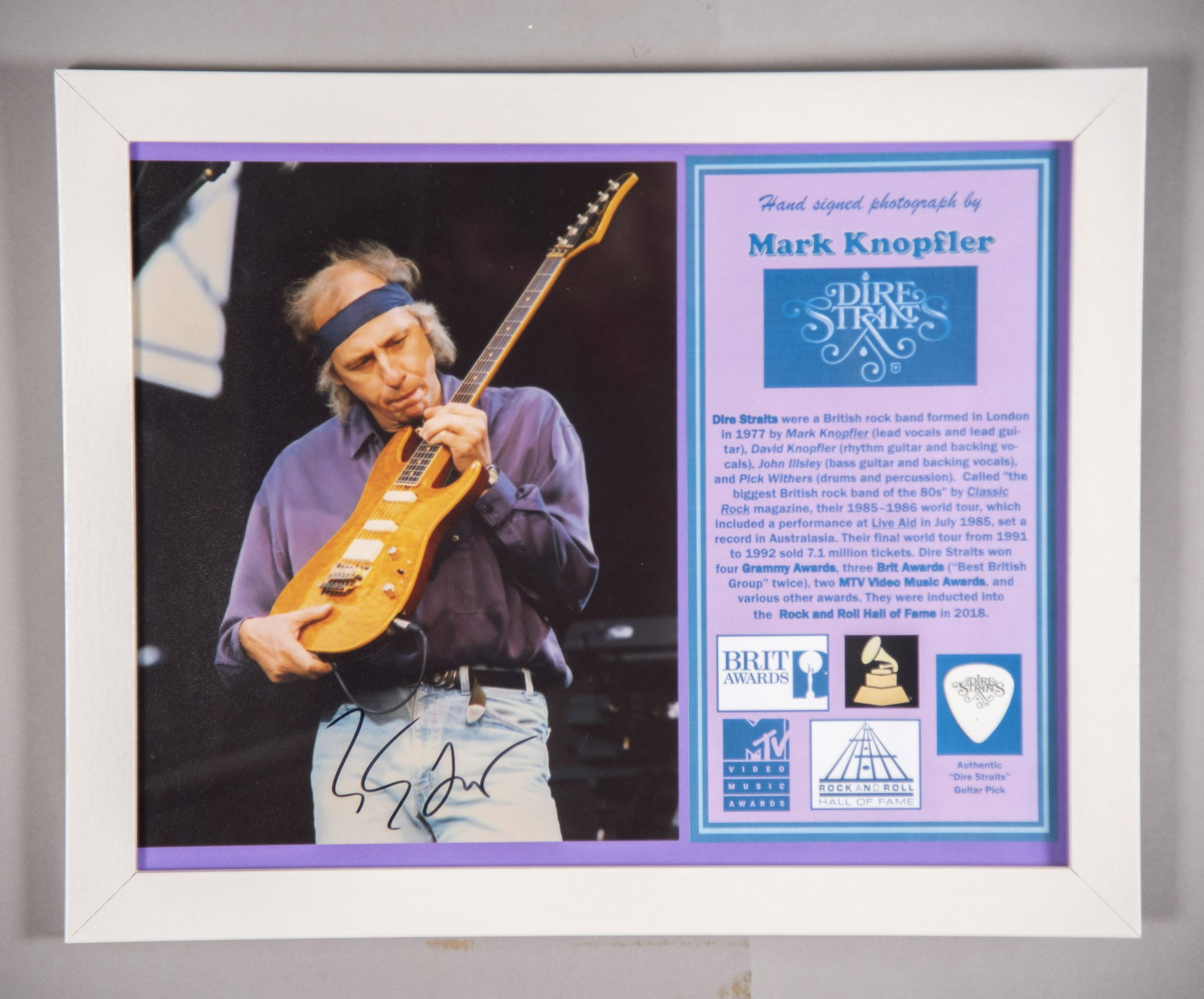 Dire Straits Signed Photo/ Pick 11x14 inches: Dire Straits Signed Photo/ Pick Hand signed photo by Mark Knopfler, lead vocals and lead guitarist for “Dire Straits”, “the biggest British rock band of the ‘80s”, noted Classic Rock Magazin