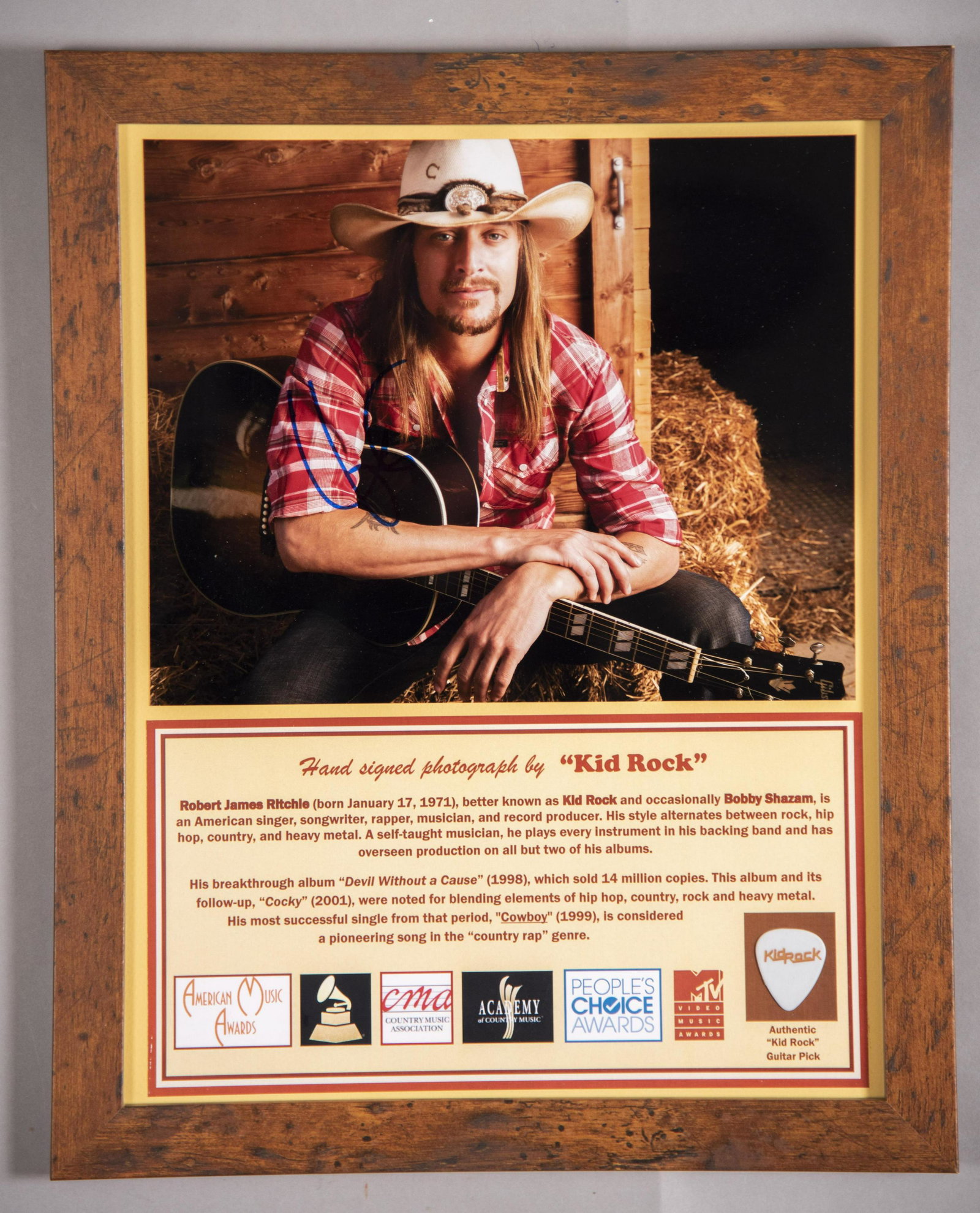 "Kid Rock" Signed Photo/ Pick 11x14 inches: "Kid Rock" Signed Photo/ Pick Hand signed photo by “Kid Rock”, singer, songwriter, musician and record producer. A self-taught musician, he plays every instrument in his backing band. Wi