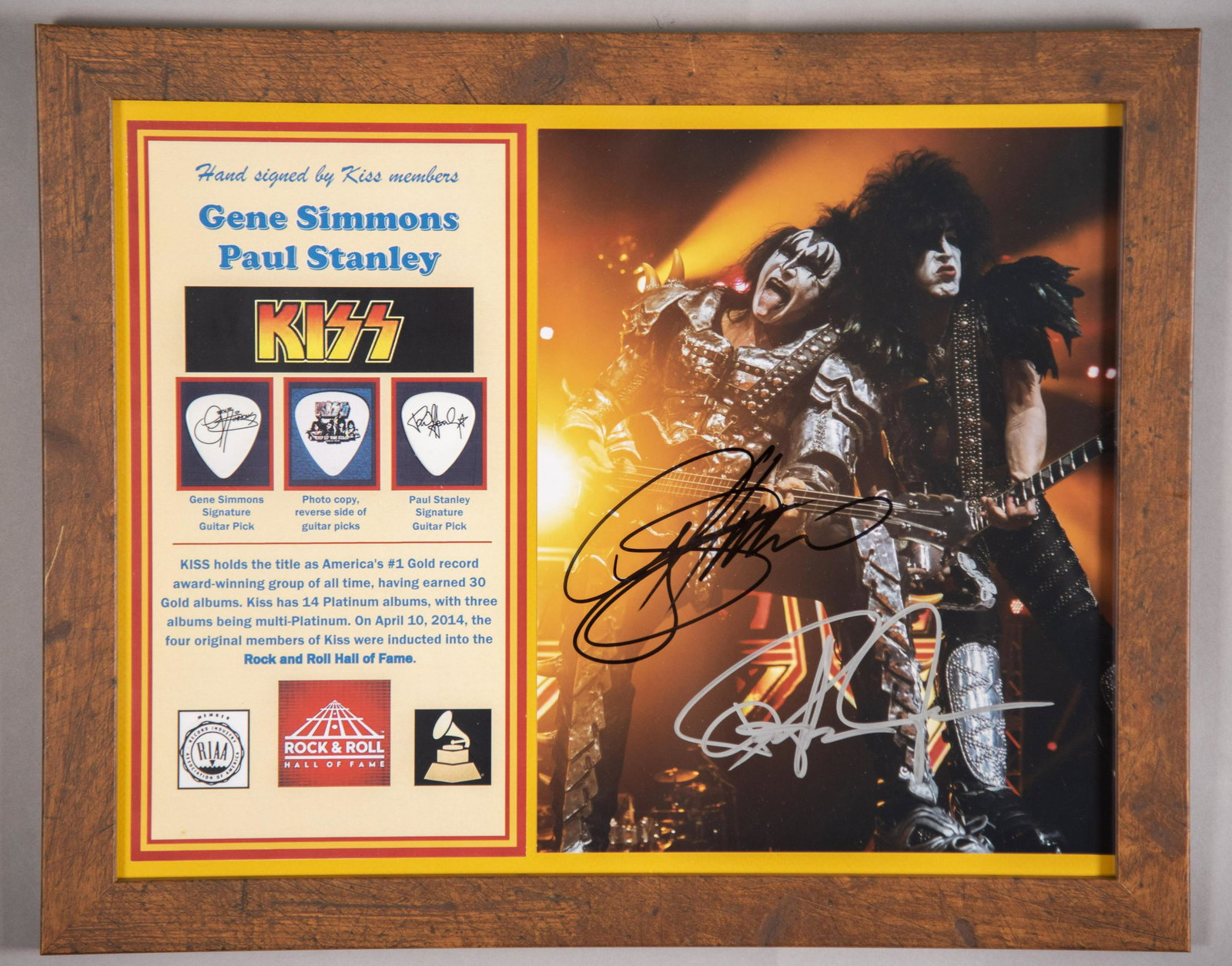 Kiss Signed Photo/ Two Picks 11x14 inches: Kiss Signed Photo/ Two Picks Hand signed photo by “KISS’s” dynamic duo, Gene Simmons and Paul Stanley. “KISS” is America’s #1 Gold Record award-winning group of all time, having earned 30 