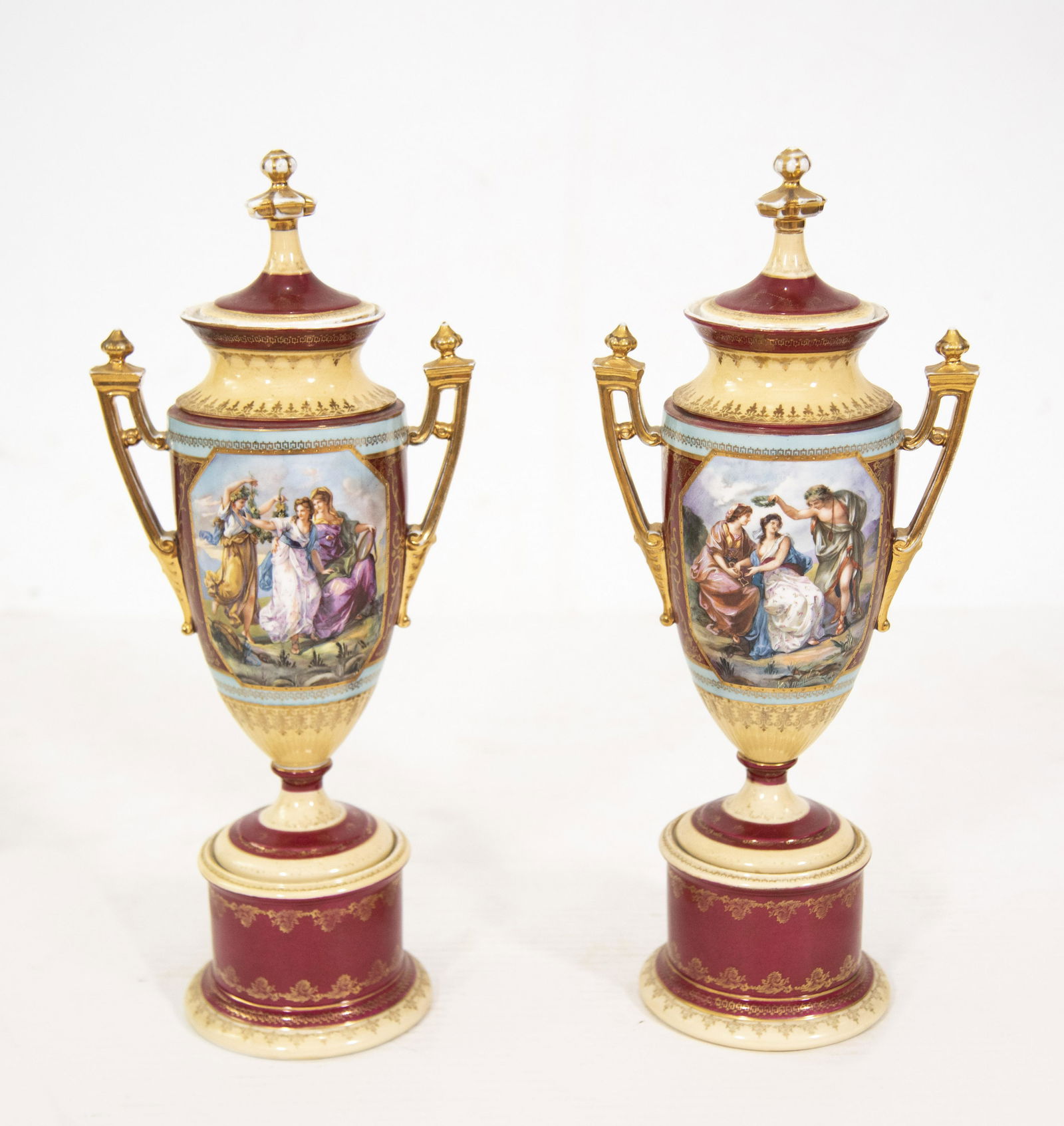 A Pair of Royal Vienna Covered Urns on Bolted Pedestals (1 of 3)