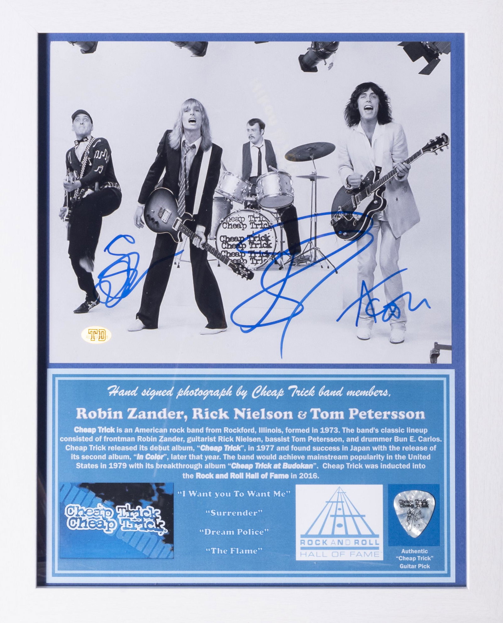 Cheap Trick Signed Photo / Pick 11x14 inches: Cheap Trick Signed Photo / Pick Hand signed concert photo by Robin Zander, Rick Nielson and Tom Petersson of pop-rock band Cheap Trick. Numerous hits like "I Want You to Want Me" and "T