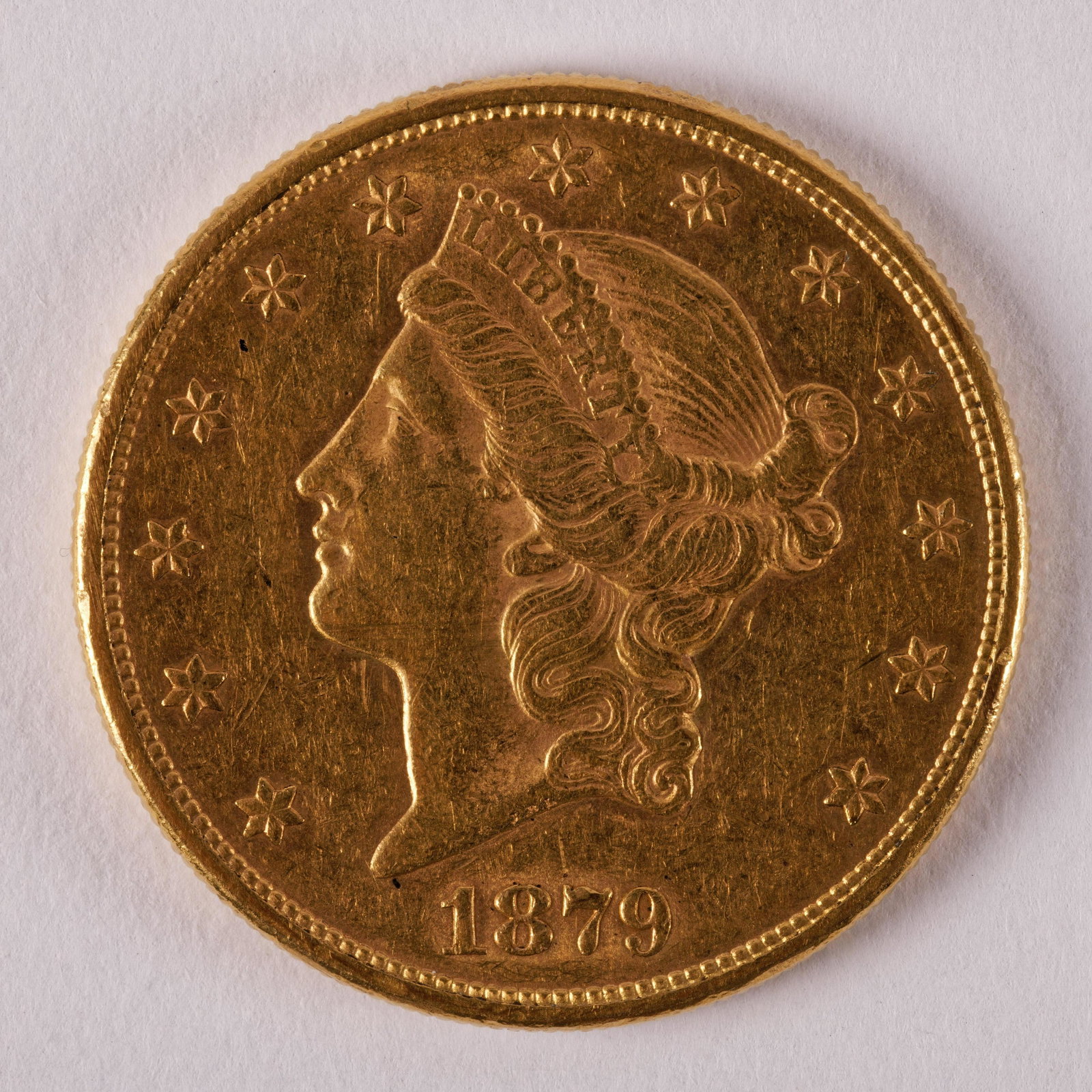 1879 Twenty Dollar Gold Piece: 1879 Twenty Dollar Gold Piece Weight 21.5 DWT VF20 very fine condition. From the Estate of Roberta Folonie Schuetz