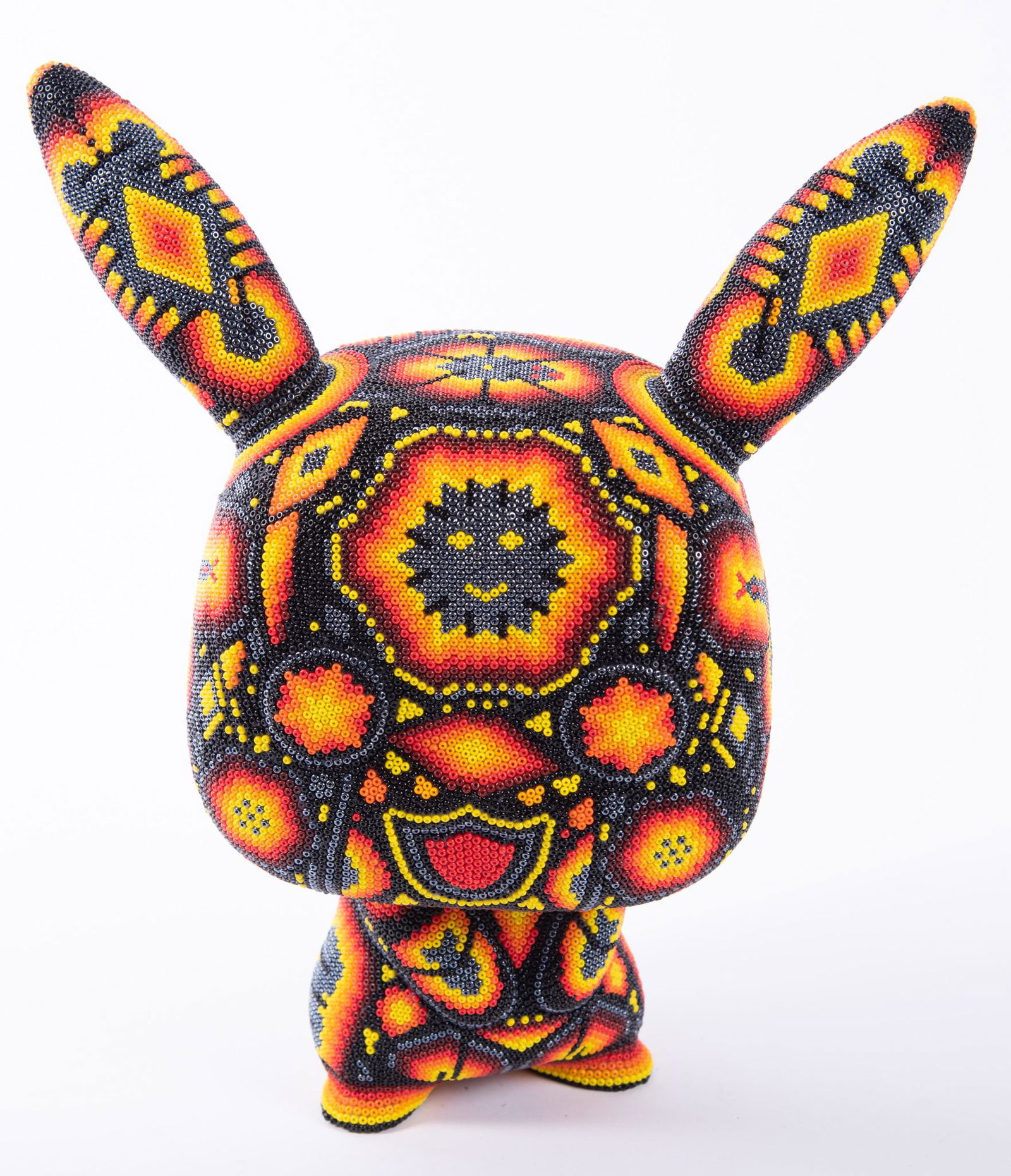 Rick Wolfryd (CHROMA), California, Mexico (1953 -), I'm: Rick Wolfryd (CHROMA)California, Mexico, (1953 - )I'm All Earscolor beaded vinyl sculpture with huichol style beadingsigned and dated 2021 .0007 edition of 100, comes with certificate of authenticity1
