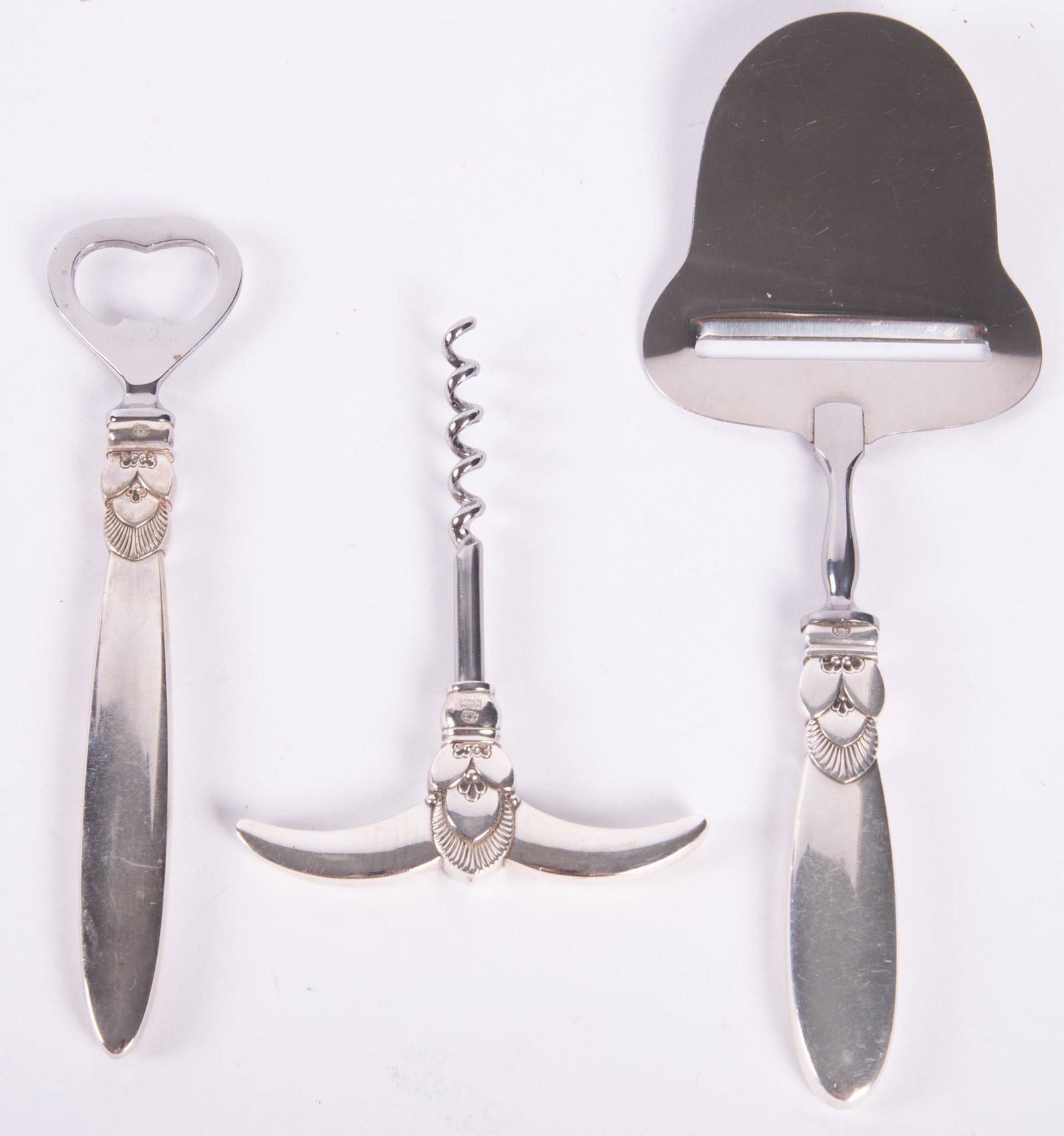 Georg Jensen Sterling Silver Bar Tools: Georg Jensen Sterling Silver Bar ToolsThree piece set of Georg Jensen Bar tools. Corkscrew wine opener, bottle opener and cheese knife. Excellent condition.
