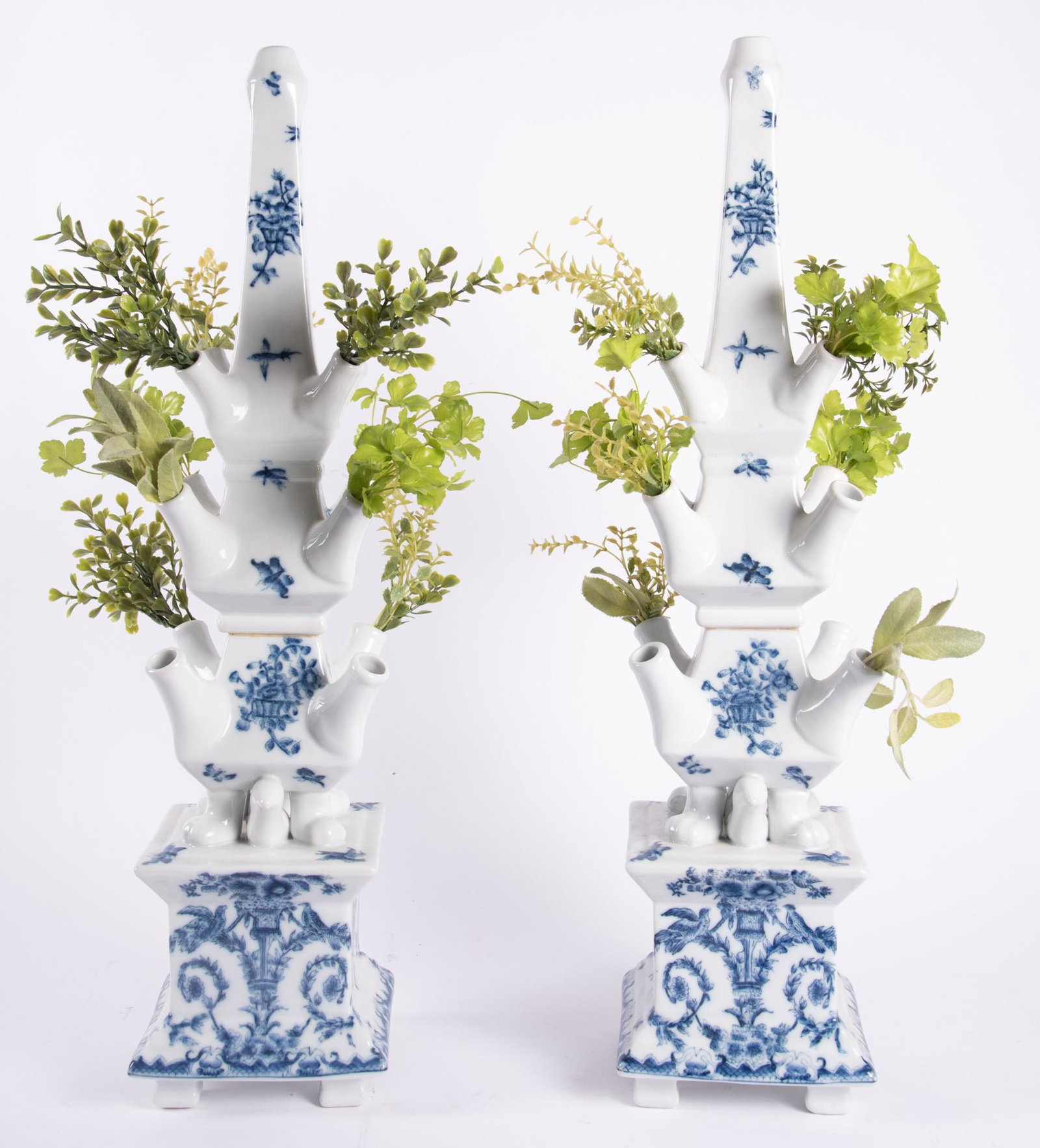 A Pair of Tall 3-Tier Porcelain Tulip Vases: A Pair of Tall 3-Tier Porcelain Tulip VasesVintage blue and white porcelain obelisk shaped tulip vases with floral, butterfly and bird motifs.23.5" tall