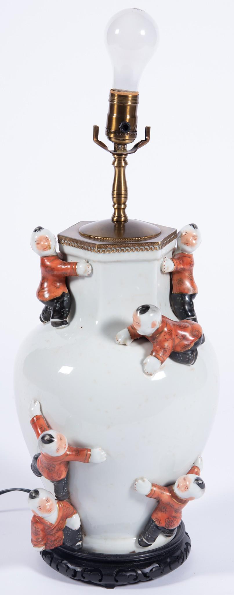 Asian Table Lamp: With applied figural decoration. From the Estate of Robert Hansen.