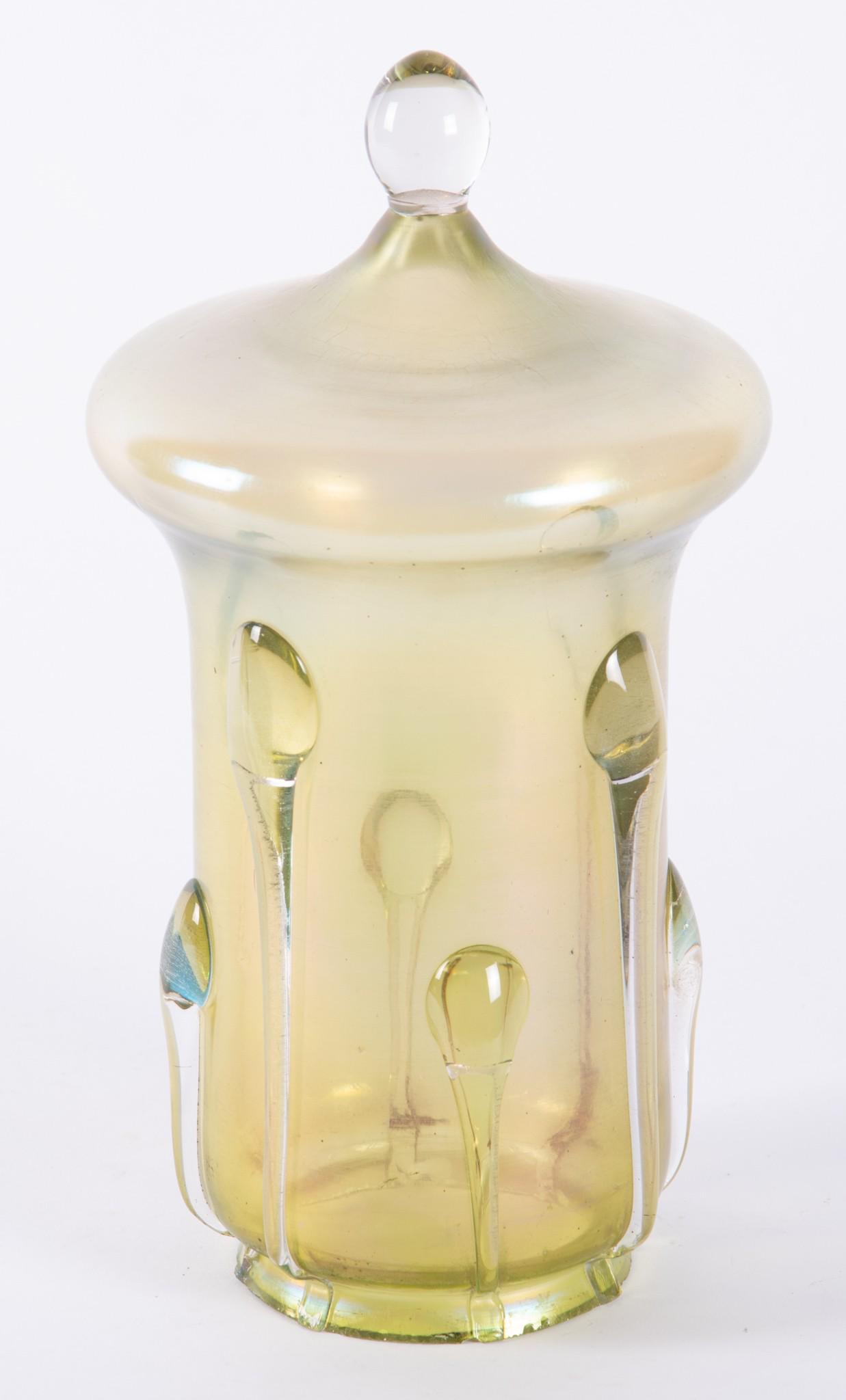 An Unusual Loetz Style Art Glass Shade: An Unusual Loetz Style Art Glass Shade Probably for a hanging fixture, the green glass shade with tear drop design, 10.25" tall, 3" fitter rim