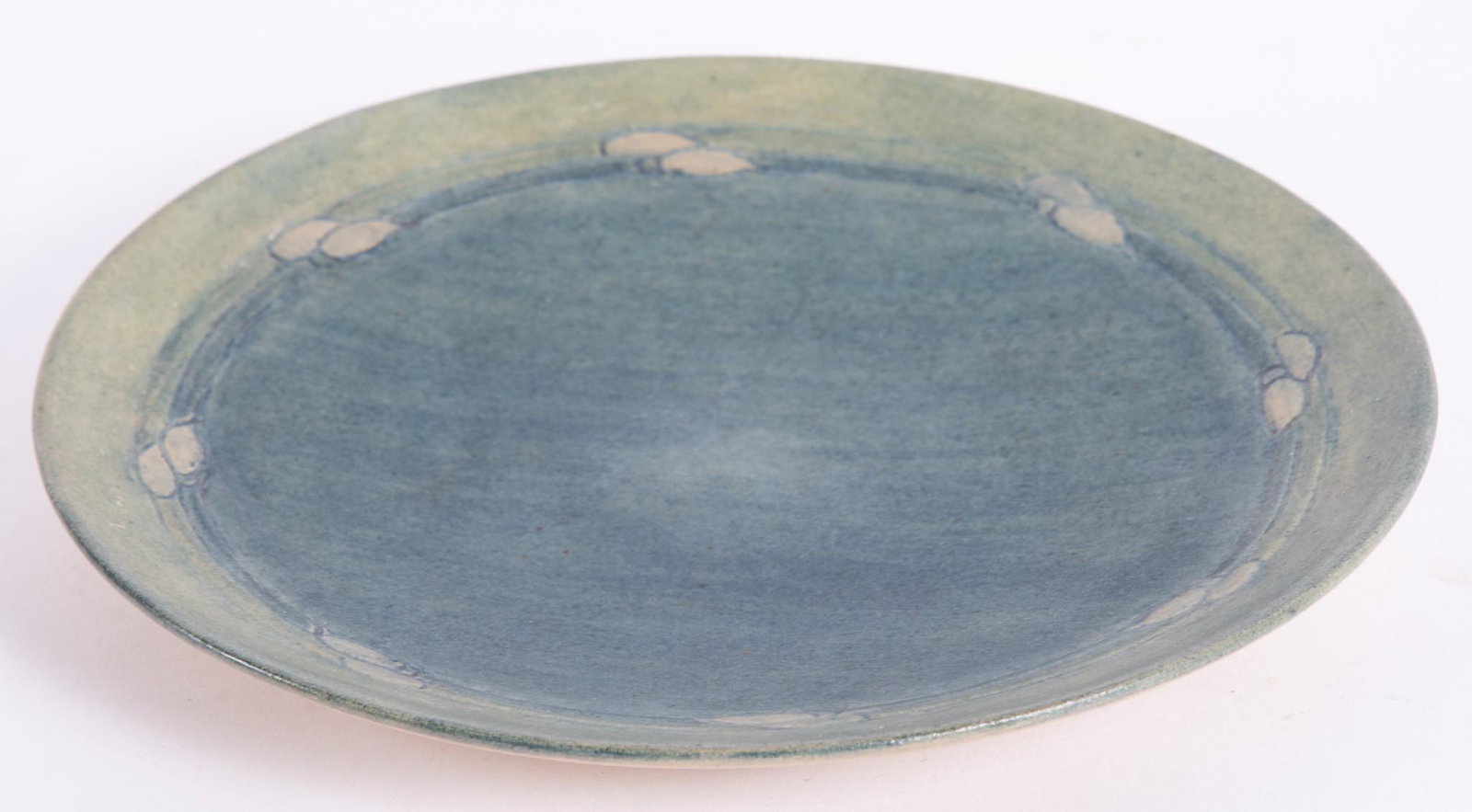 A Newcomb College Art Pottery Plate: A Newcomb College Art Pottery Plate A good Newcomb small plate with typical Arts & Crafts blue/green glaze. 7 1/2" diameter
