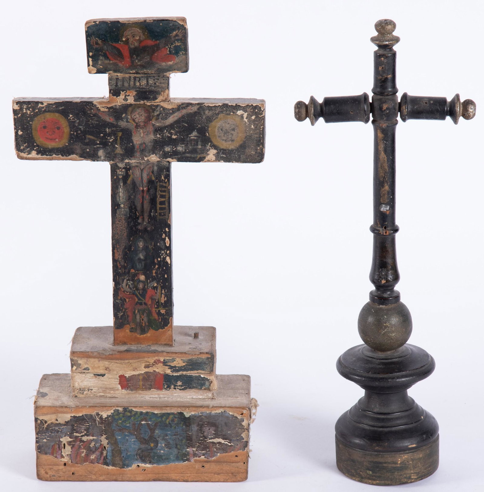 Antique Spanish Colonial Crucifixes from Mexico: Antique Spanish Colonial Crucifixes from Mexico One is finely painted The other is ebonized wood with gilt detailing Each measuring approximately 14 inches tall