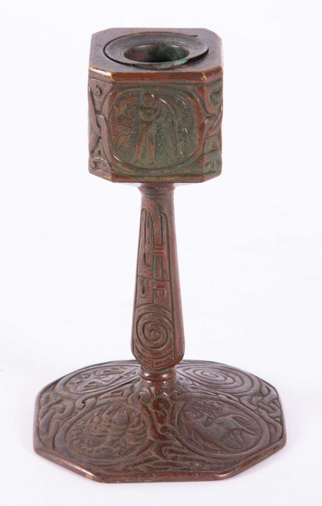 Tiffany Studios Zodiac Pattern Bronze Candlestick: Tiffany Studios Zodiac Pattern Bronze Candlestick Stamped Tiffany Studios, New York, 1206 Height: 5 3/4 inches; Base: 3 3/4 inches