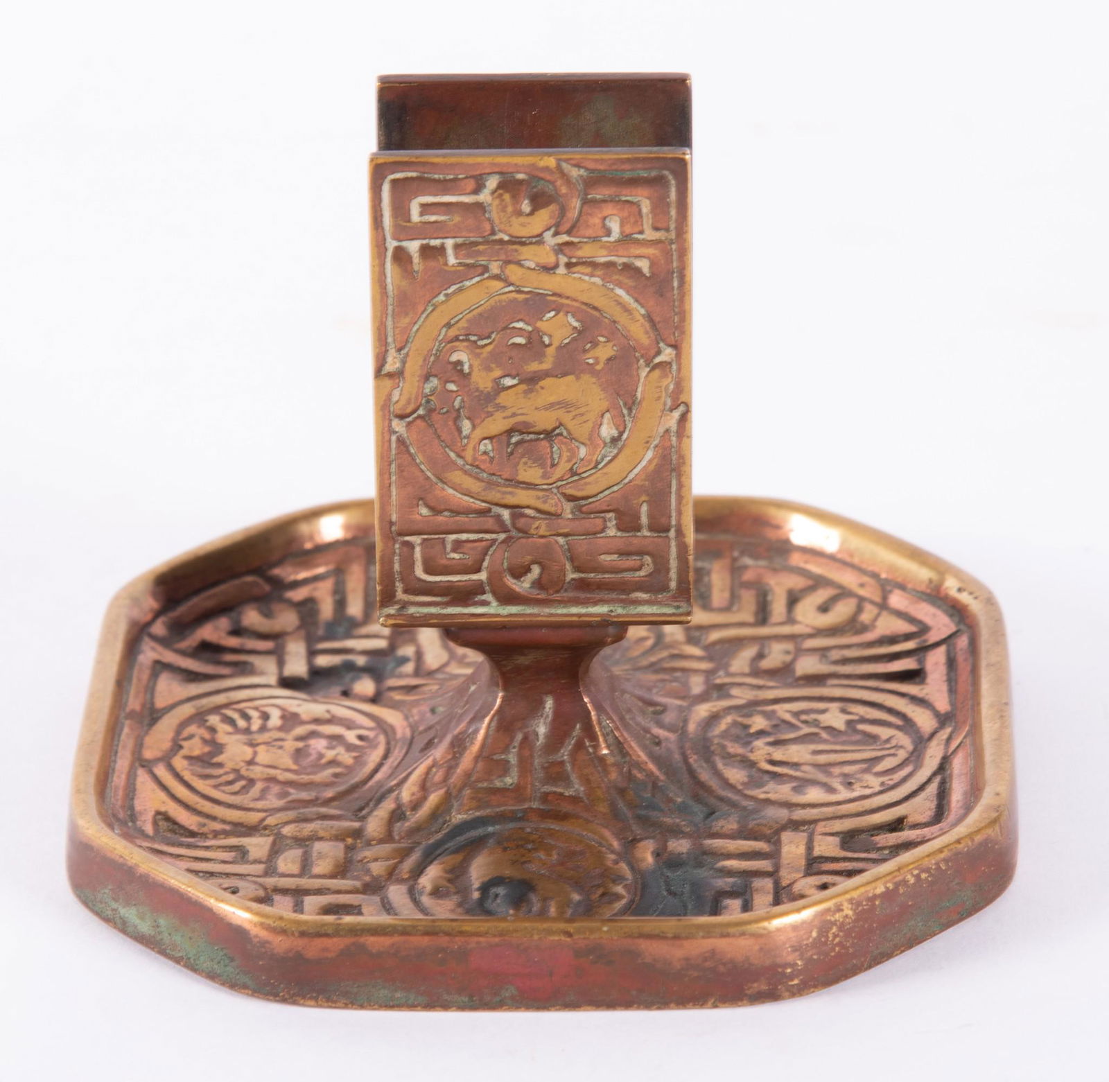 Tiffany Studios Zodiac Pattern Bronze D'Ore Matchbox Holder: Tiffany Studios Zodiac Pattern Bronze D'Ore Matchbox HolderMarked on the side: Tiffany Studios, New York, #1041Height: 4 inches; Base: 4 1/2 x 4 1/2 inches