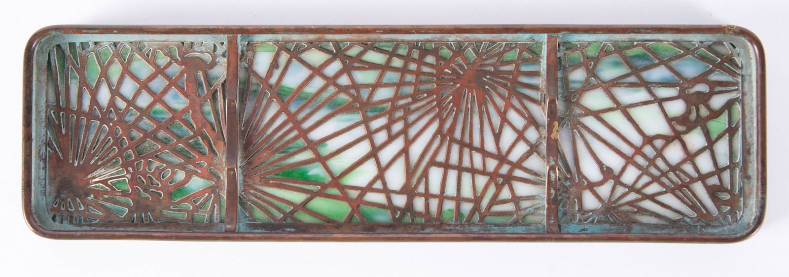 Tiffany Pine Needle Pen Tray: Tiffany Pine Needle Pen Tray Bronze footed tray with pierced pine needle pattern over green and white slag glass, marked Tiffany Studios, New York, Length: 9 3/4 inches; Width: 2 7/8 inches