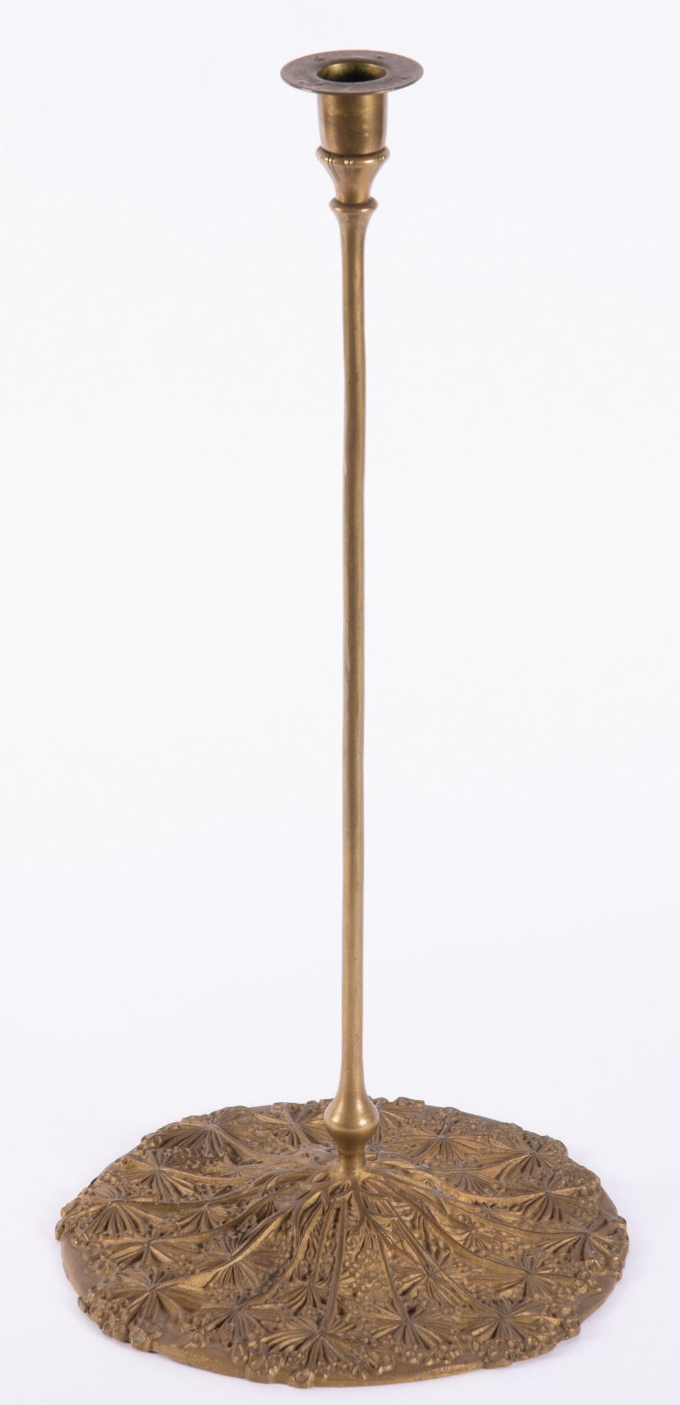 A Tiffany Studios Bronze Candlestick: A Tiffany Studios Bronze Candlestick Tall stick with elaborate base, marked Tiffany Studios, New York, D884 17" Tall